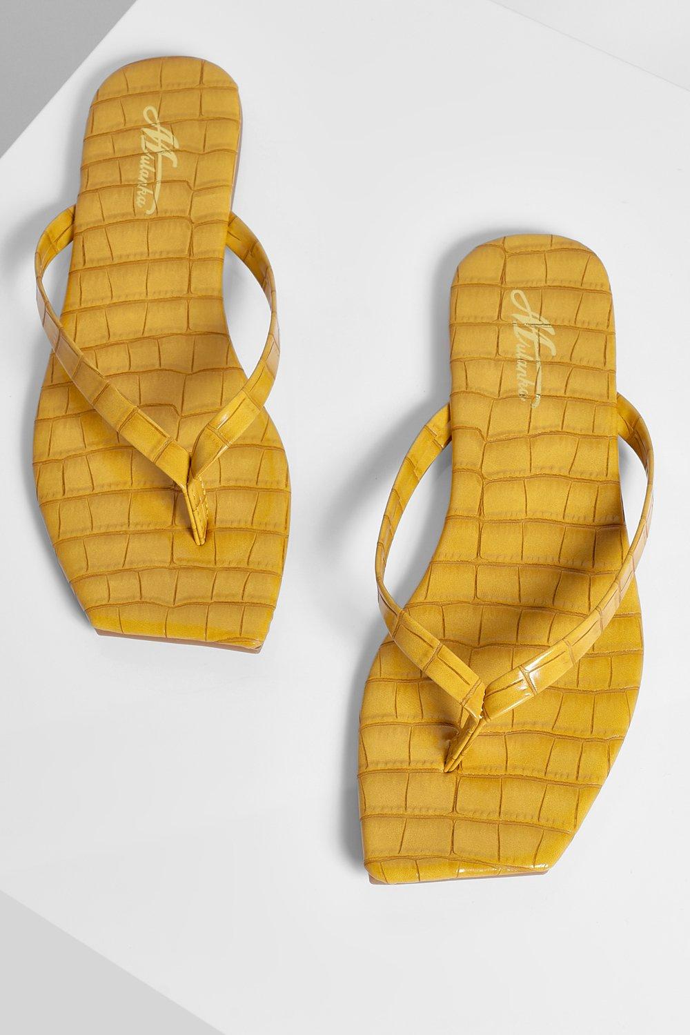 mustard flip flops