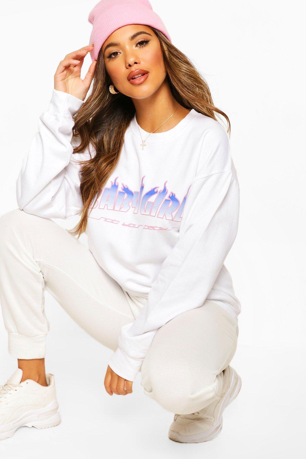 girl in oversized sweatshirt