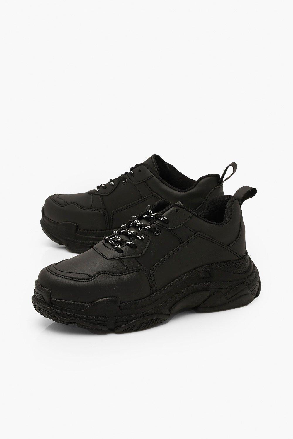 black platform trainers