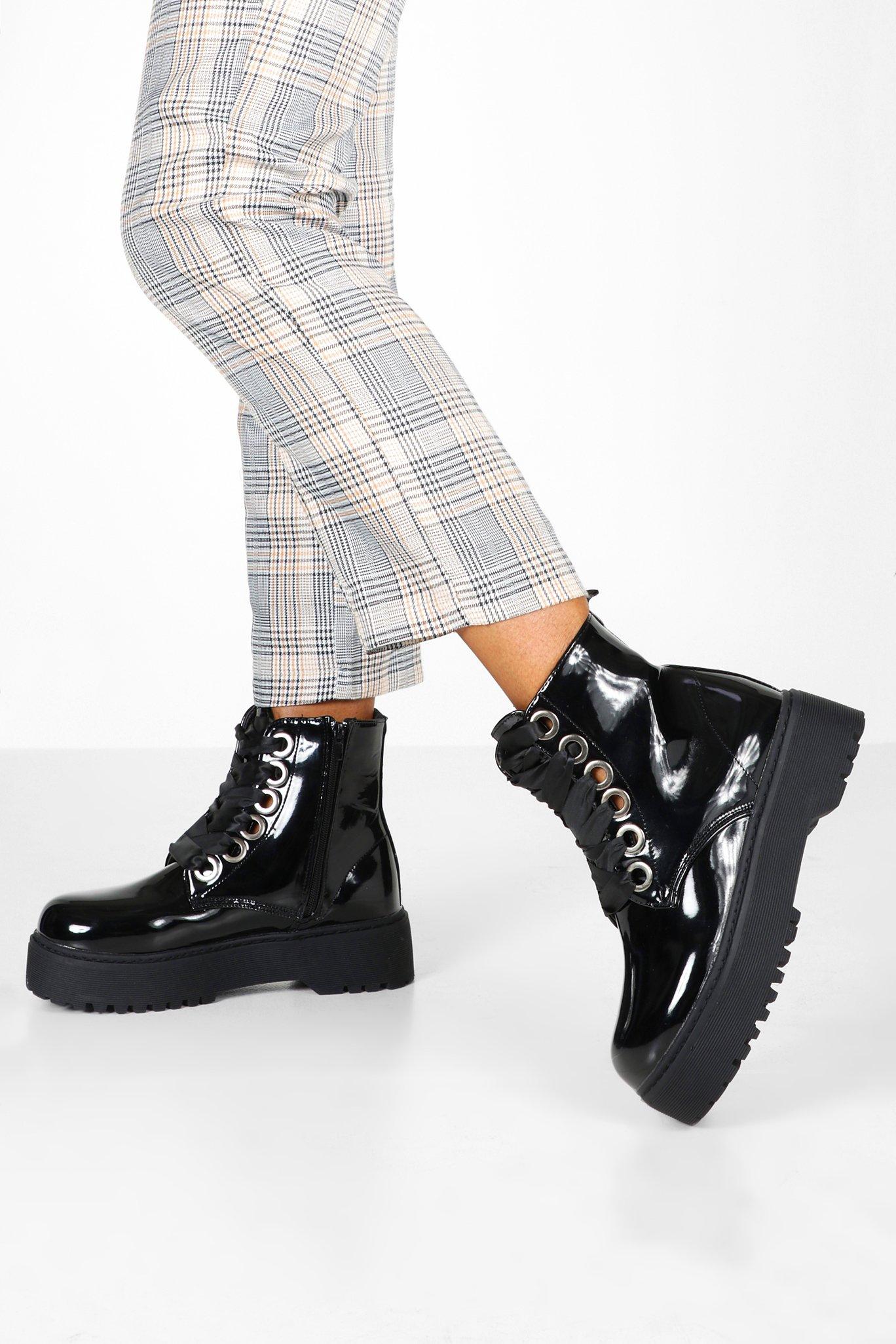 black lace up patent boots