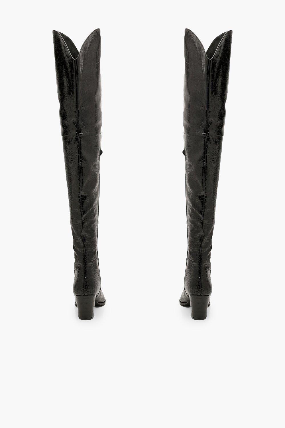 thigh high croc boots