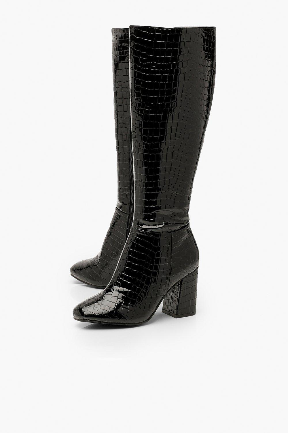 black fitted knee high boots