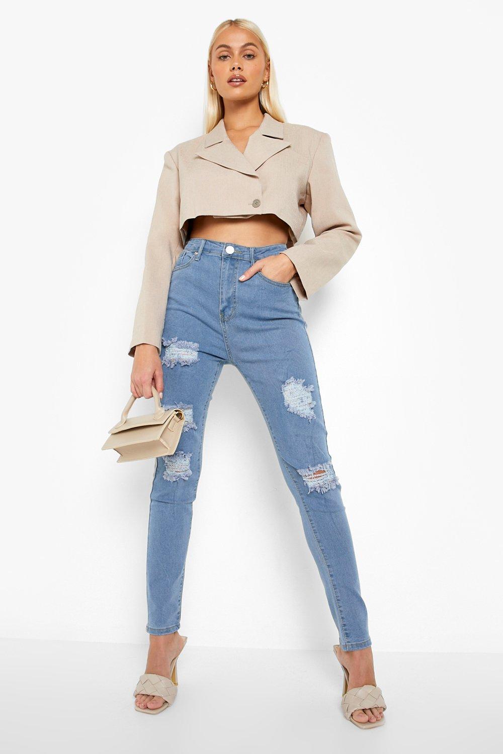 super distressed skinny jeans