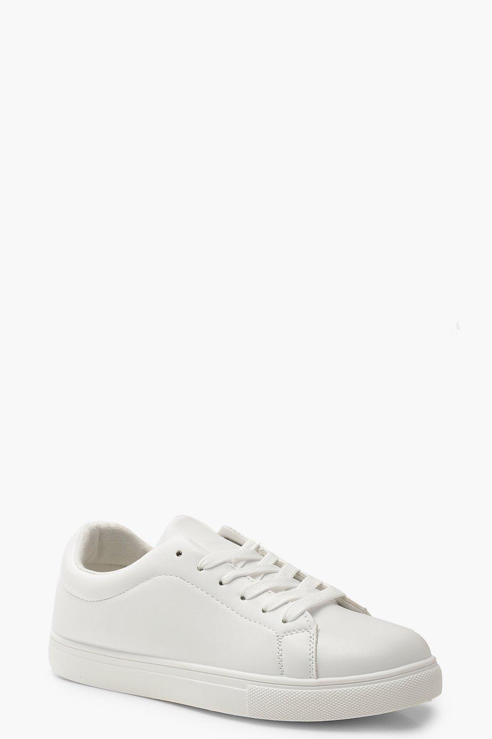 white flat trainers uk