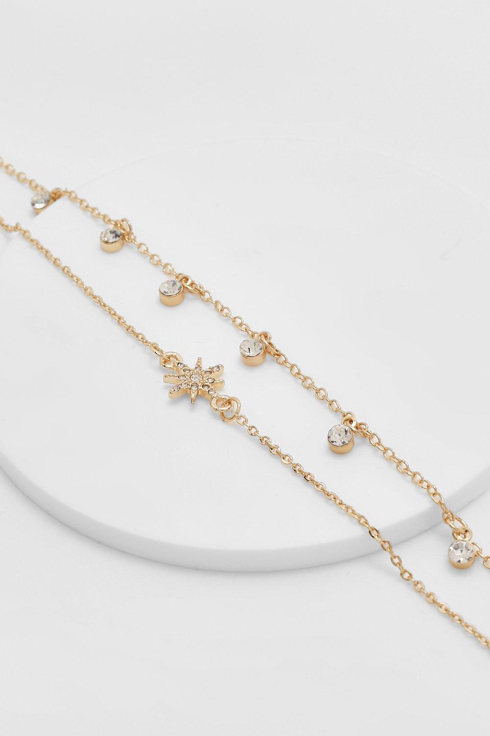 Image of Cavigliera color oro a doppia catena con stella e strass, Metallics