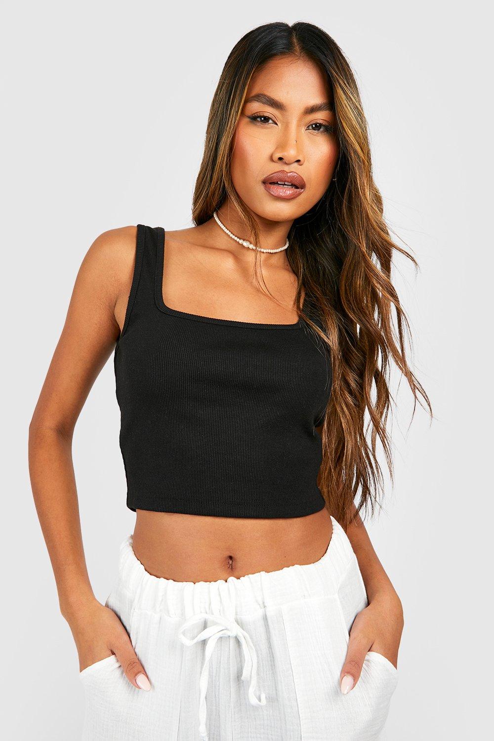 Image of Crop top asimmetrico a coste con cut-out, Nero