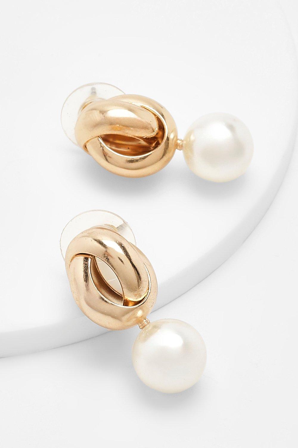 Image of Orecchini pendenti con perle attorcigliate color oro, Metallics