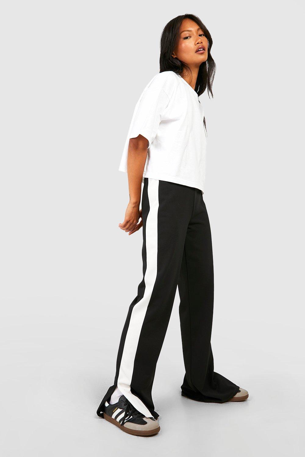 Image of Pantaloni a vita alta con striscia laterale e spacco sul fondo, Nero
