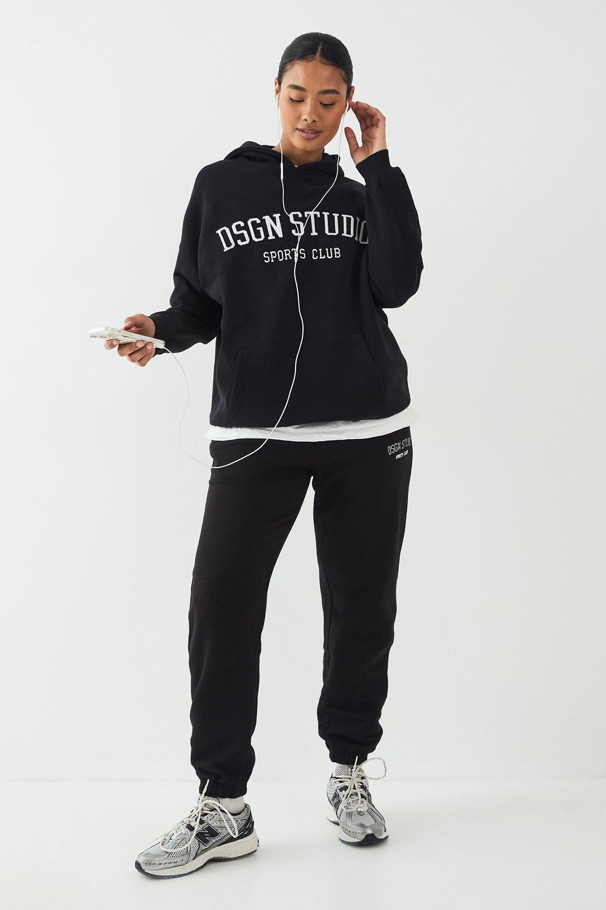 Image of Pantaloni tuta oversize Dsgn Studio con applique, Nero