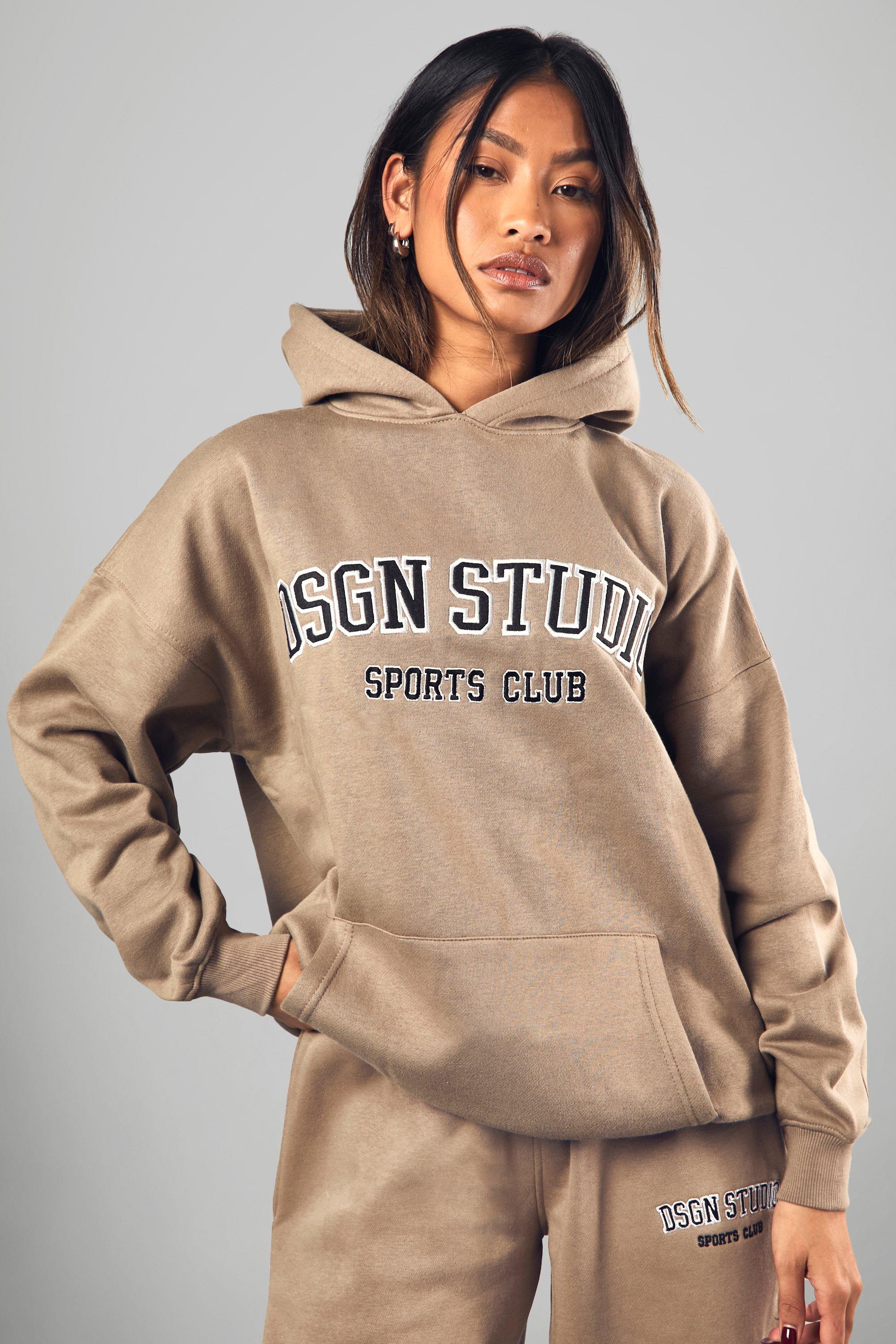 Image of Felpa oversize con applique Dsgn Studio e cappuccio, Beige