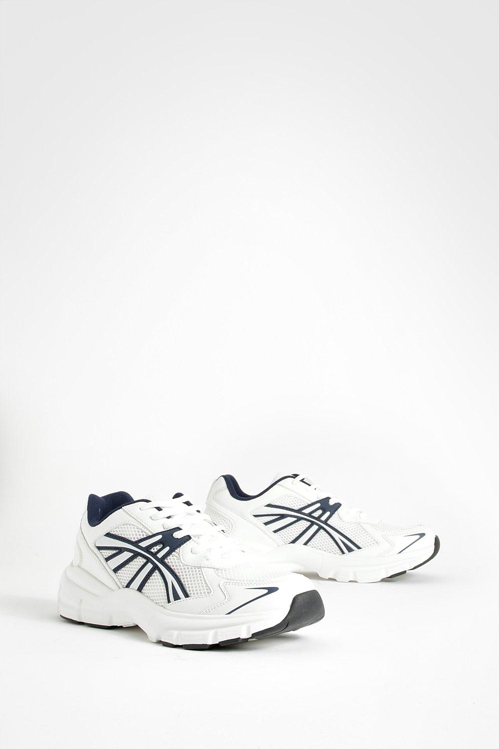 Image of Scarpe da ginnastica sportive in taglio maschile con righe a contrasto a contrasto, Bianco