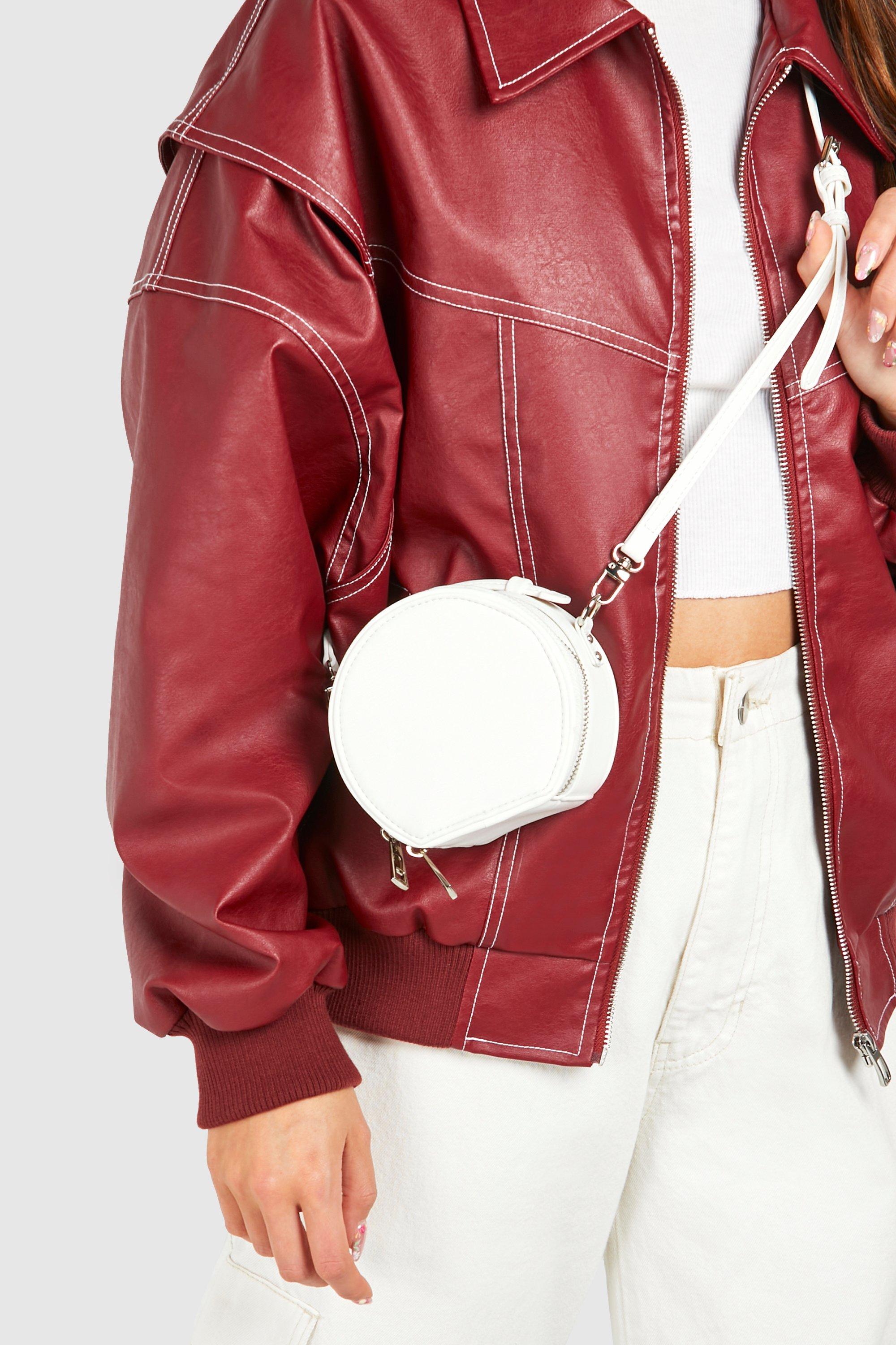 Click to view product details and reviews for Womens Circle Pu Cross Body Bag White One Size White.