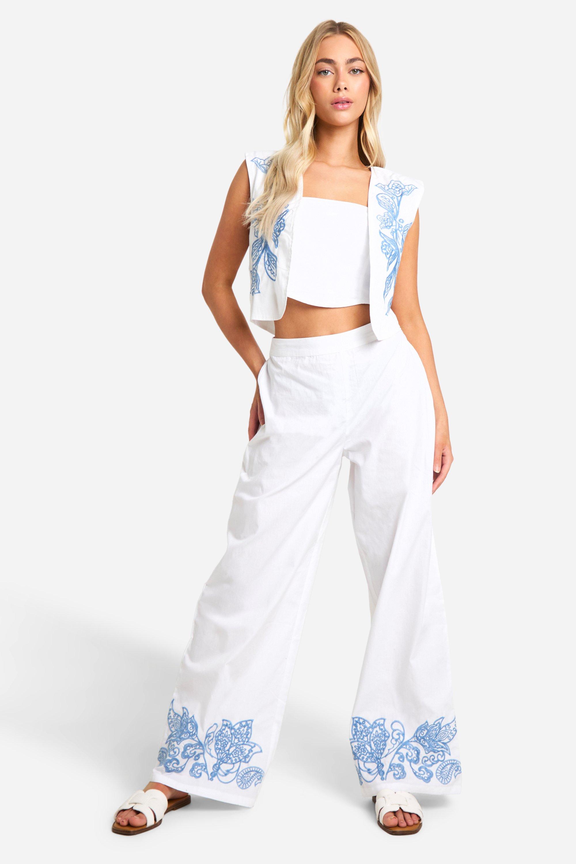 Image of Embroidered Hem Wide Leg Trousers, Bianco