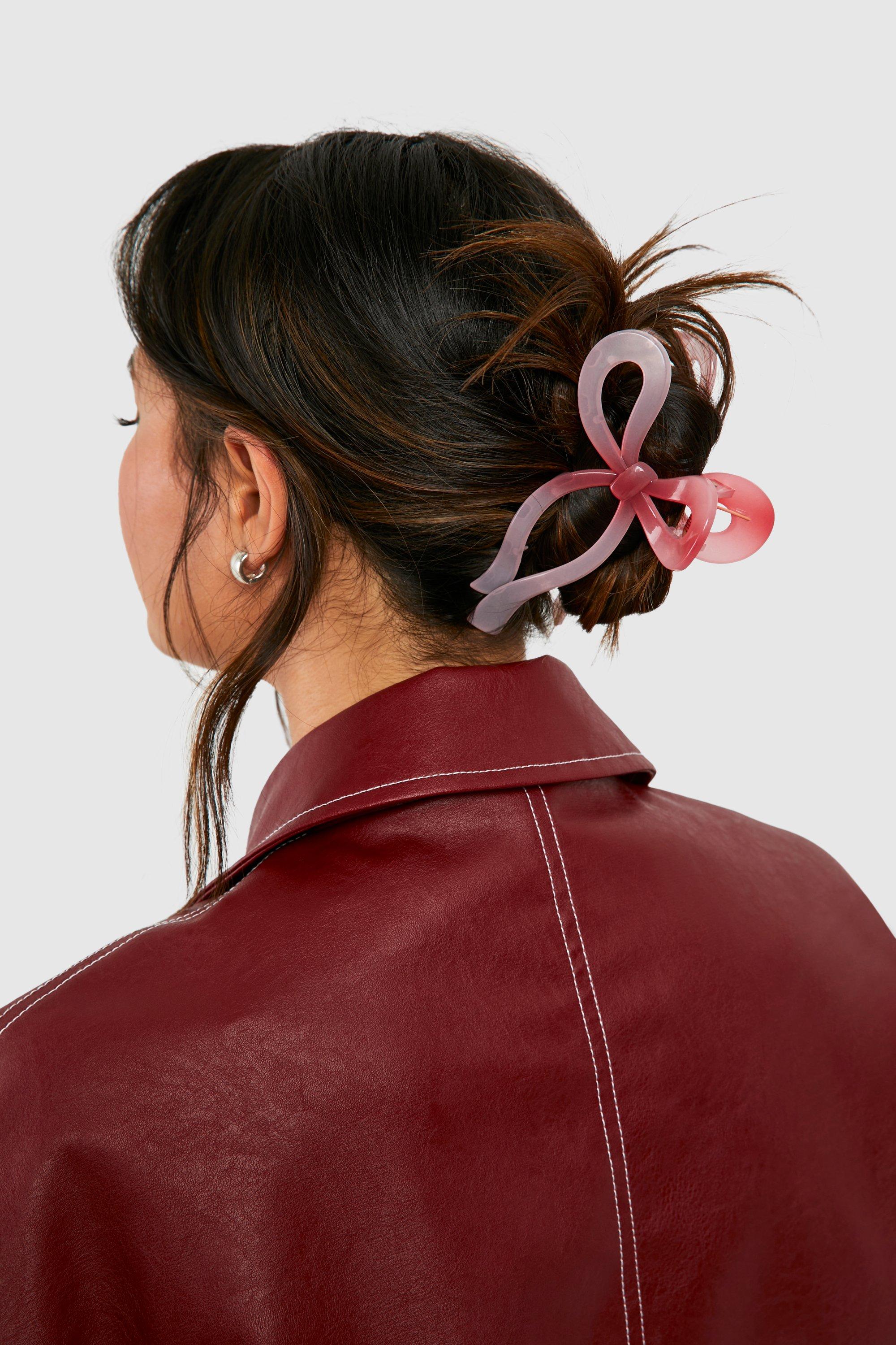 Click to view product details and reviews for Womens Bow Shaped Claw Clip Pink One Size Pink.