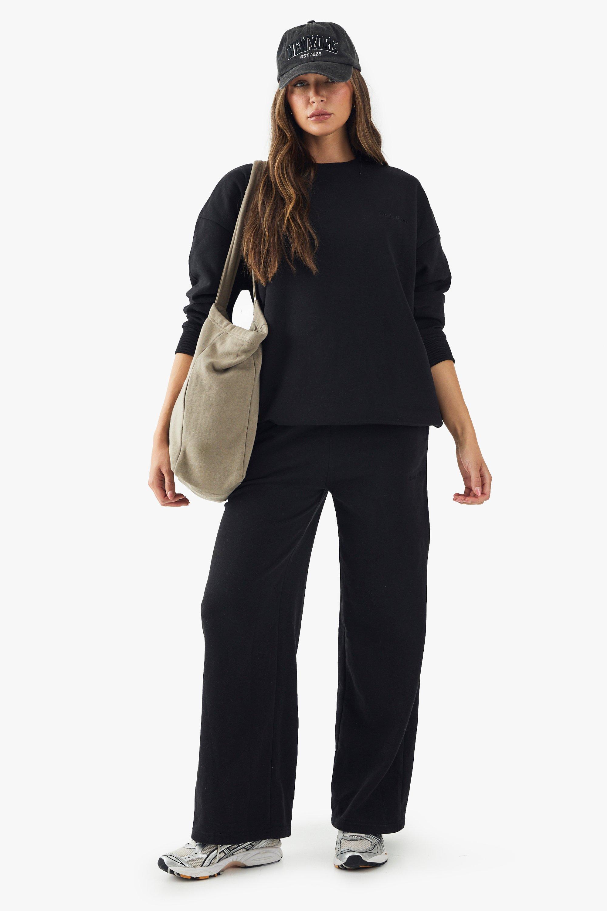 Image of Pantaloni tuta dritti con ricamo Dsgn Studio, Nero