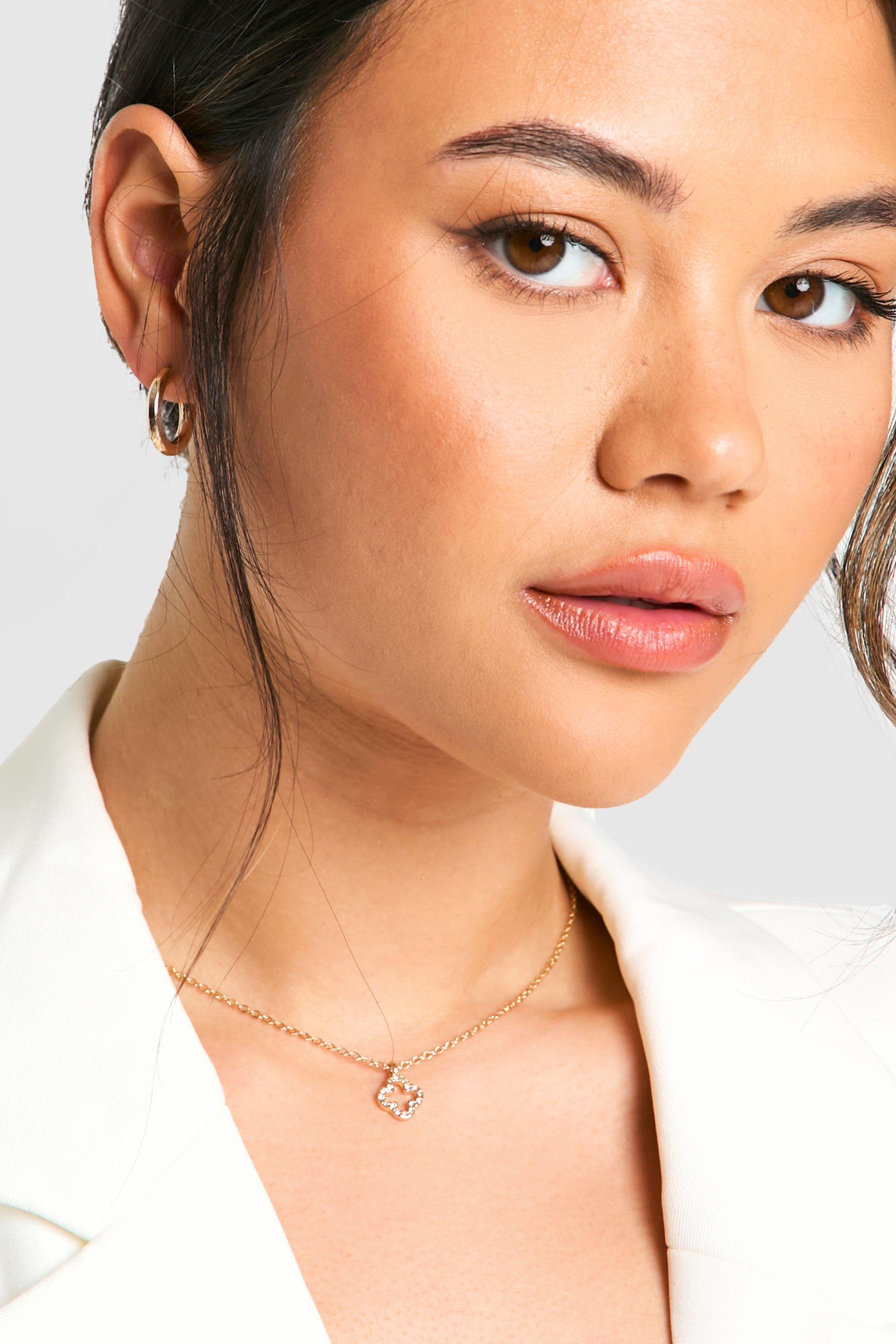 Image of Collana con pendente a quadrifoglio e strass, Metallics