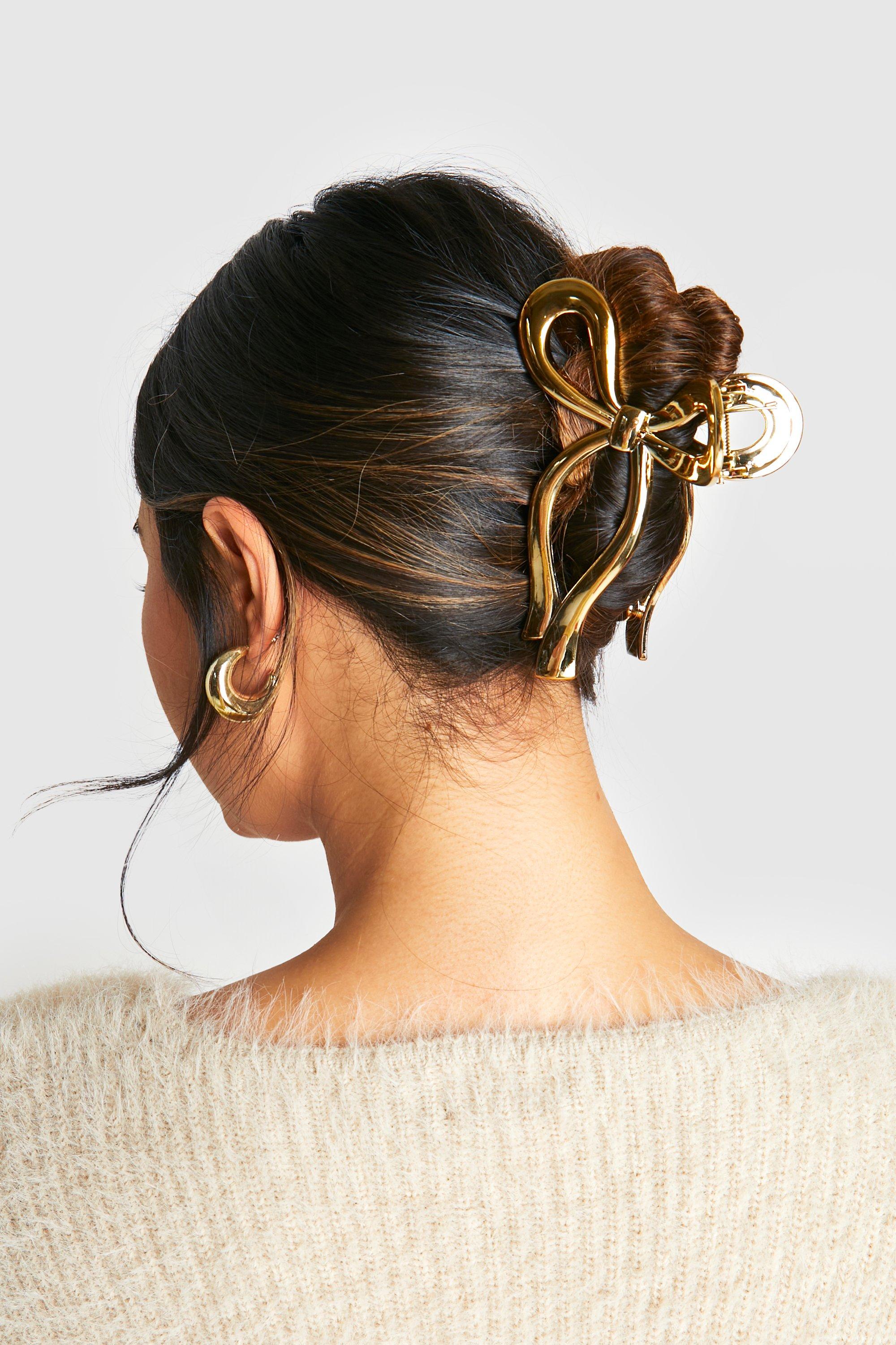 Image of Pinza per capelli color oro con fiocco, Metallics