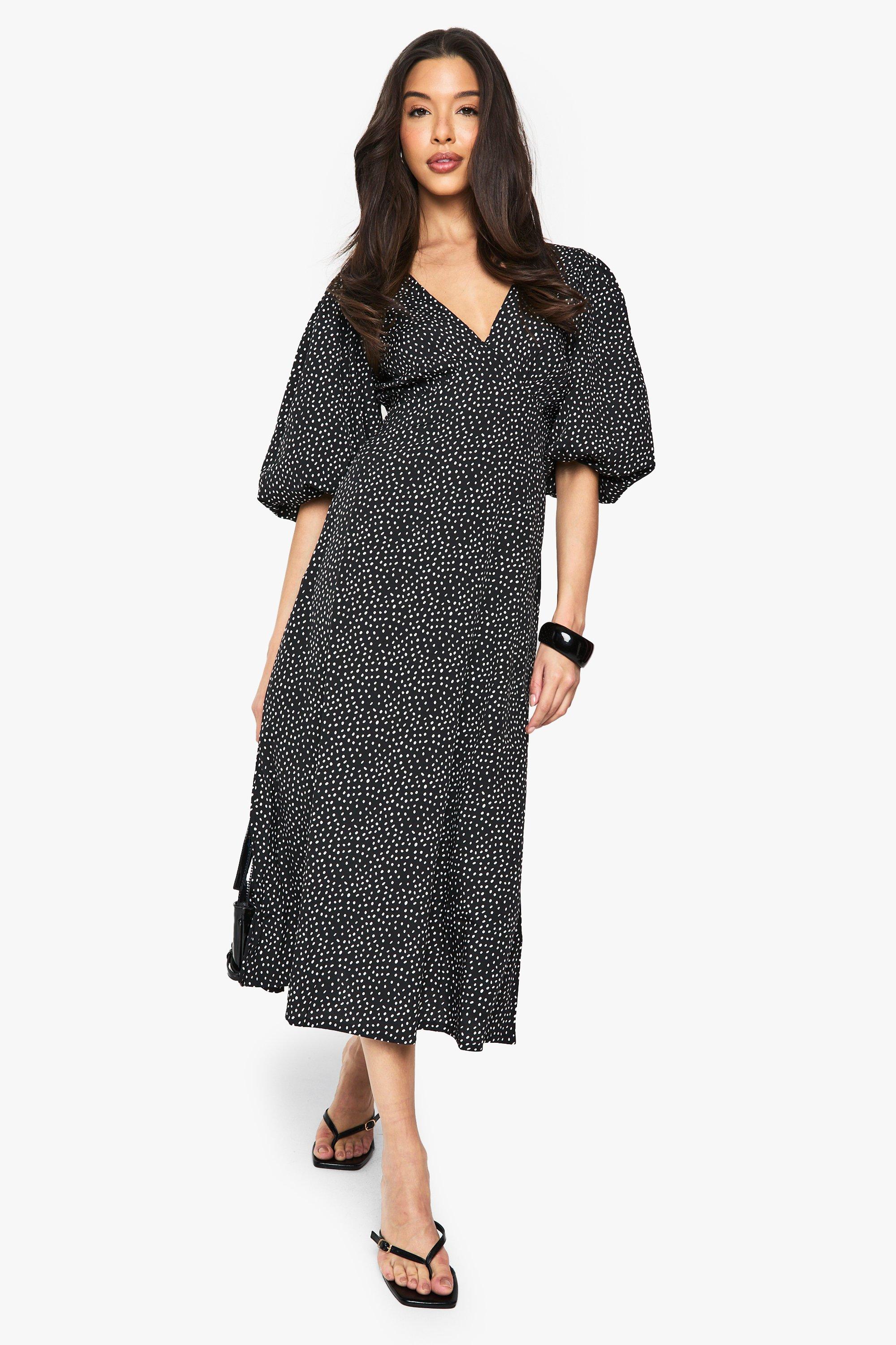 Image of Vestito midi a pois con laccetti sul retro e maniche a sbuffo, Nero