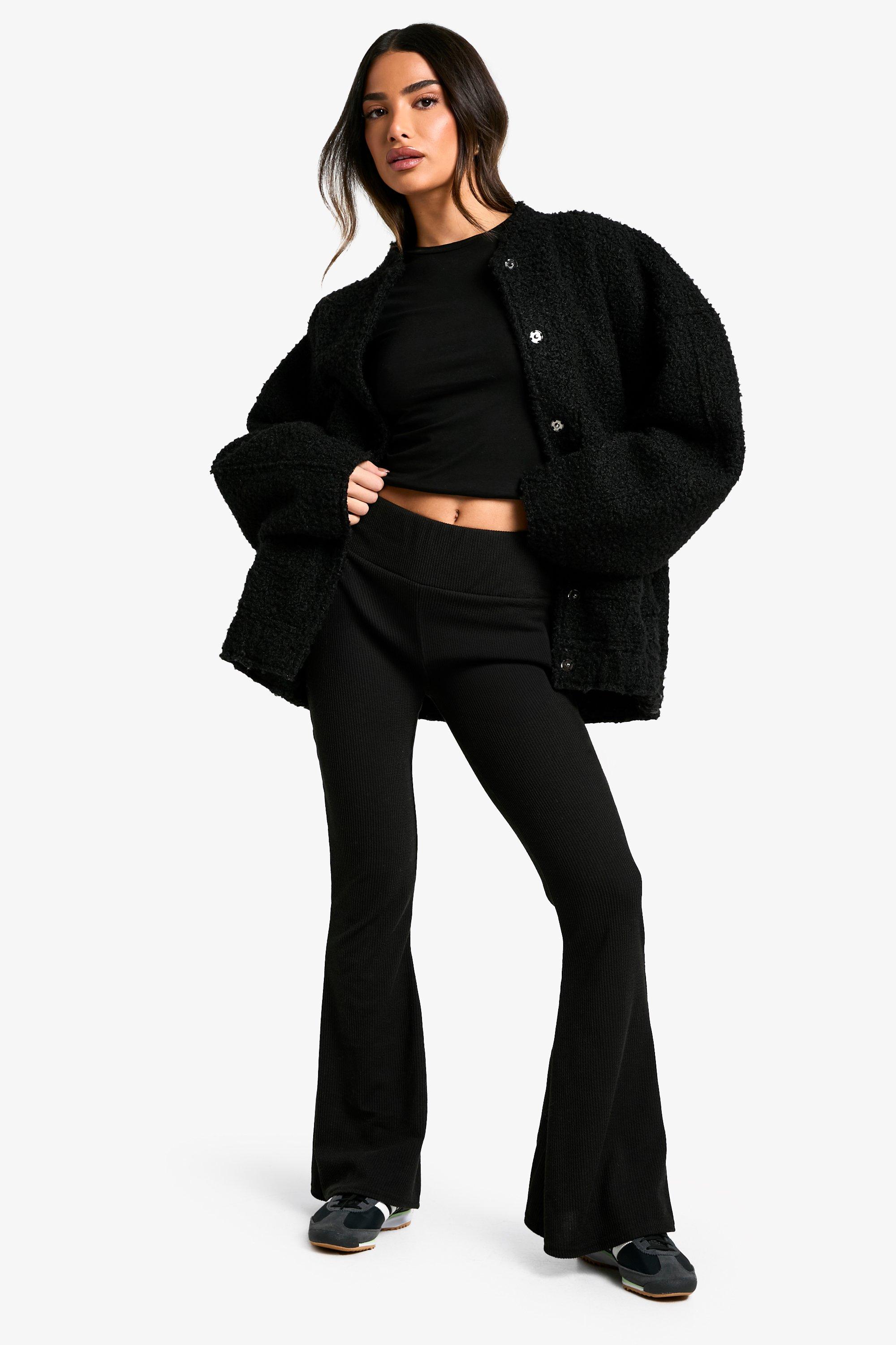 Image of Pantaloni a zampa Petite a coste effetto goffrato con fascia in vita spessa, Nero