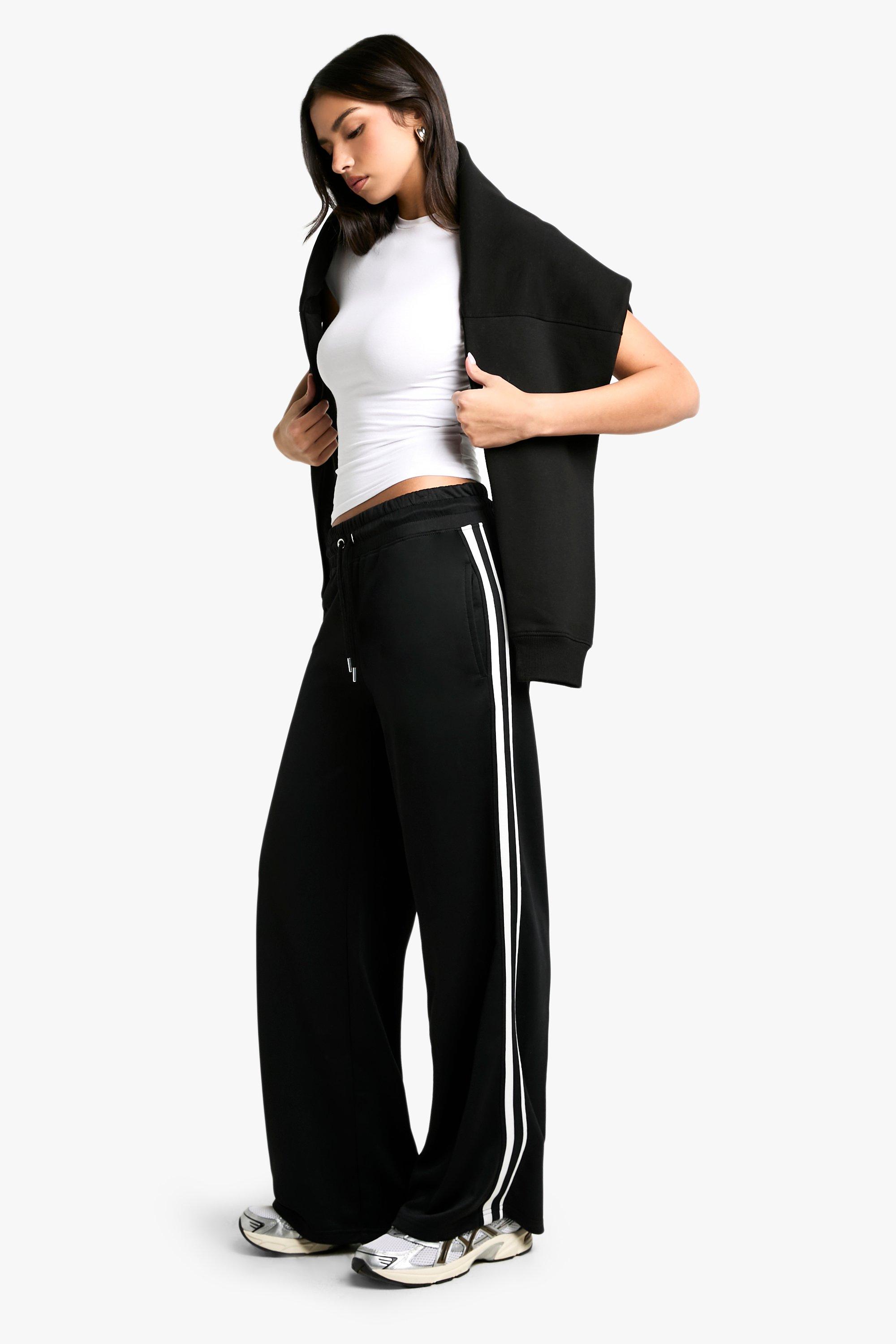 Image of Pantaloni tuta dritti in tricot a righe doppie, Nero