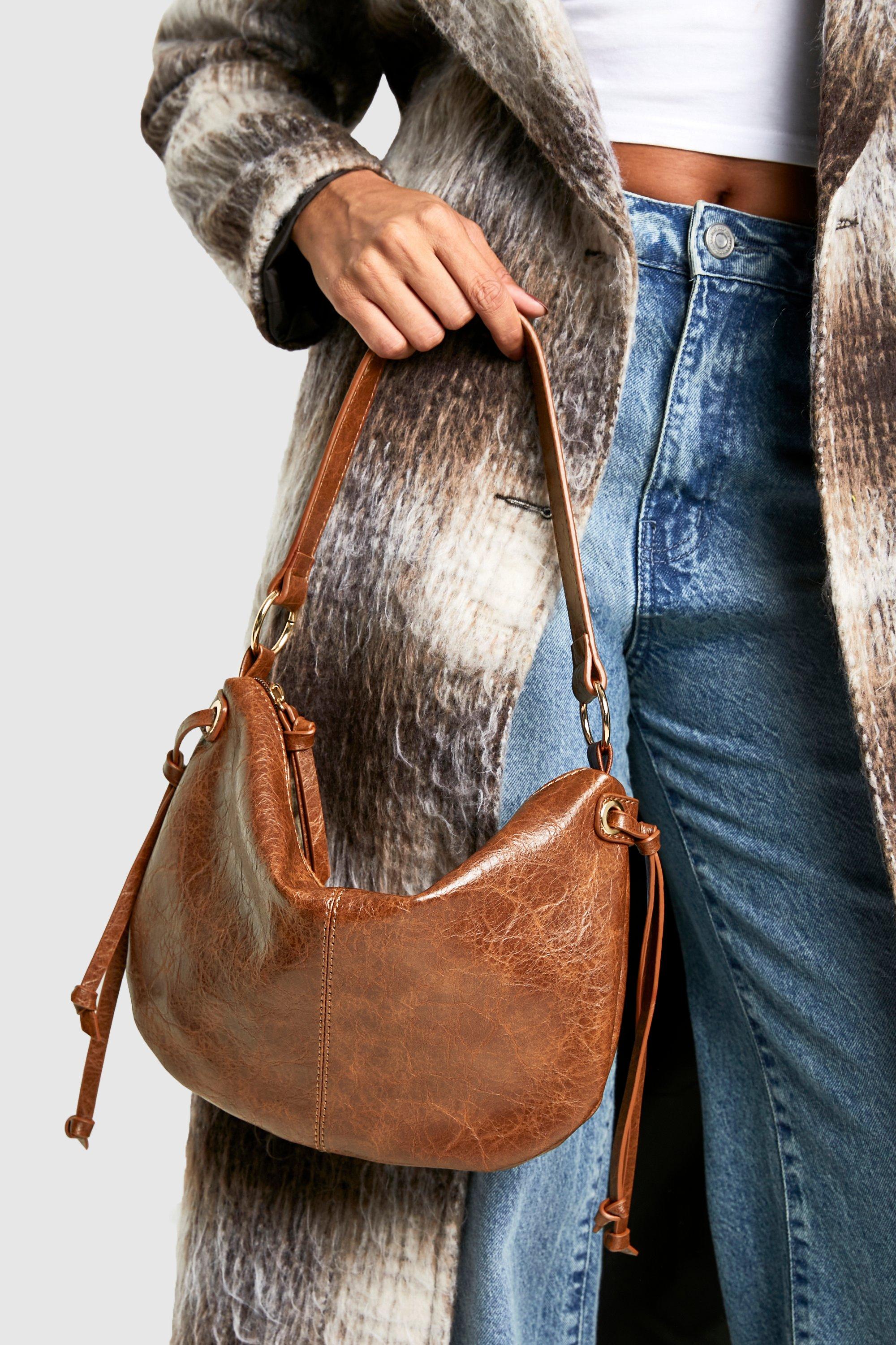 Click to view product details and reviews for Womens Distressed Leather Round Tassel Shoulder Bag Brown One Size Brown.