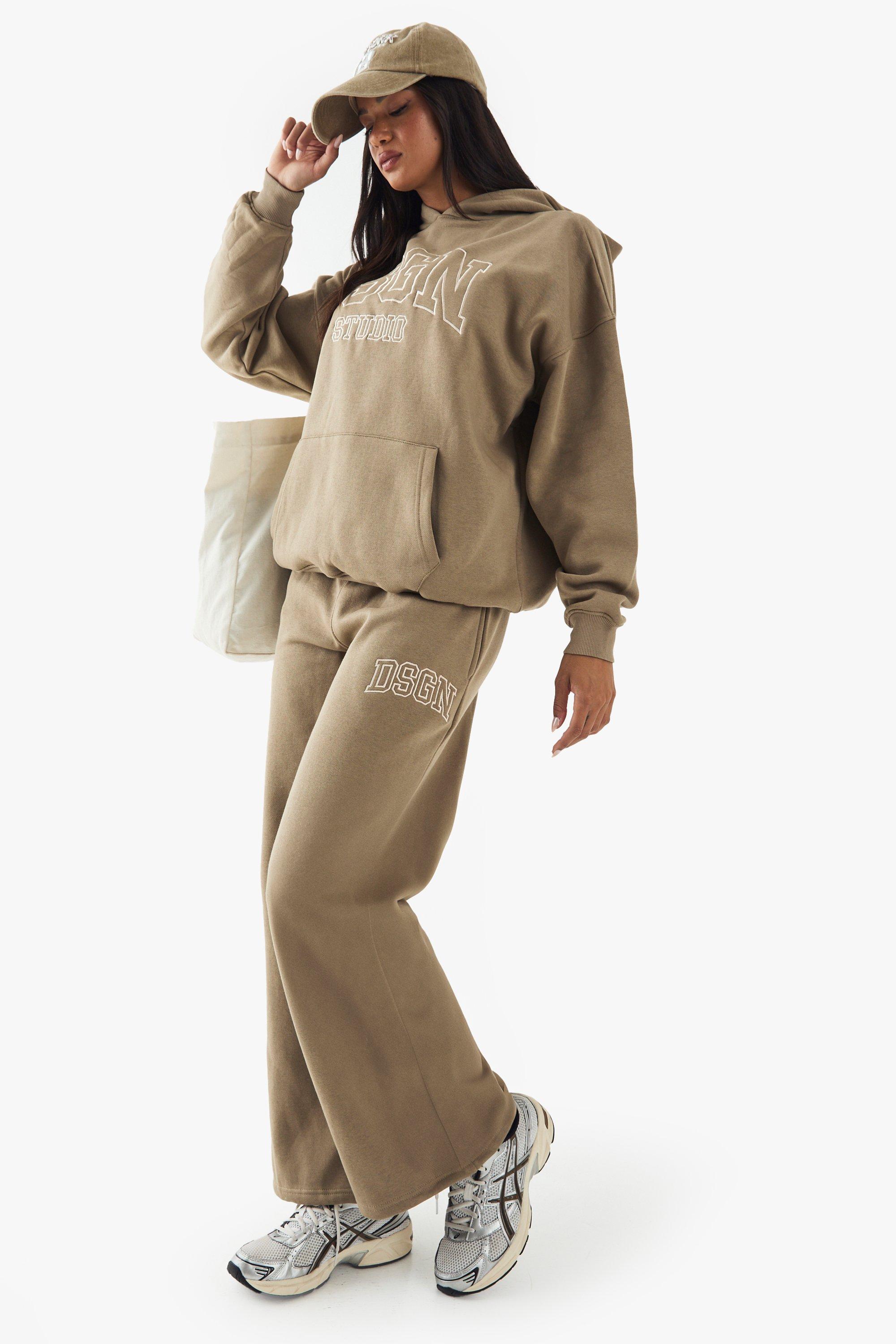 Image of Pantaloni tuta dritti Dsgn Collegiate con ricami, Verde