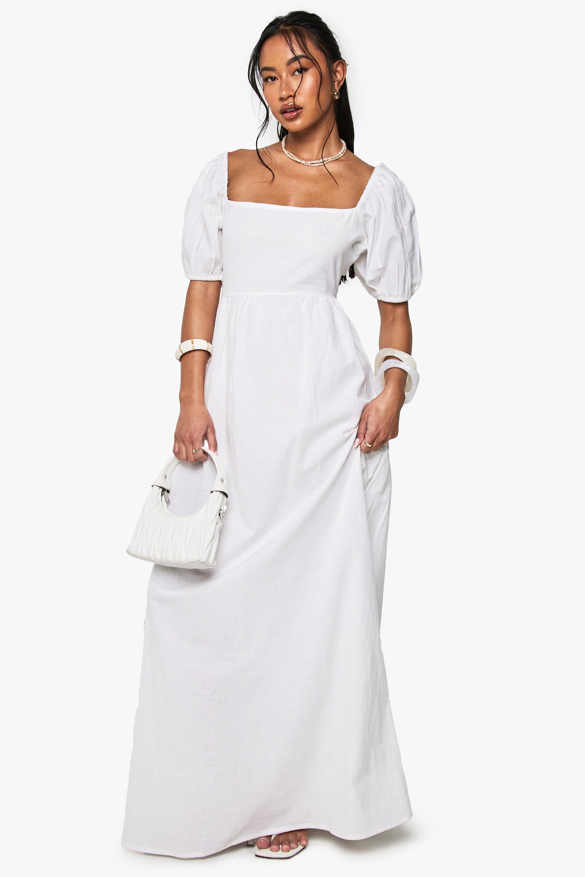 Image of Vestito maxi in lino con laccetti sul retro e maniche a sbuffo, Bianco