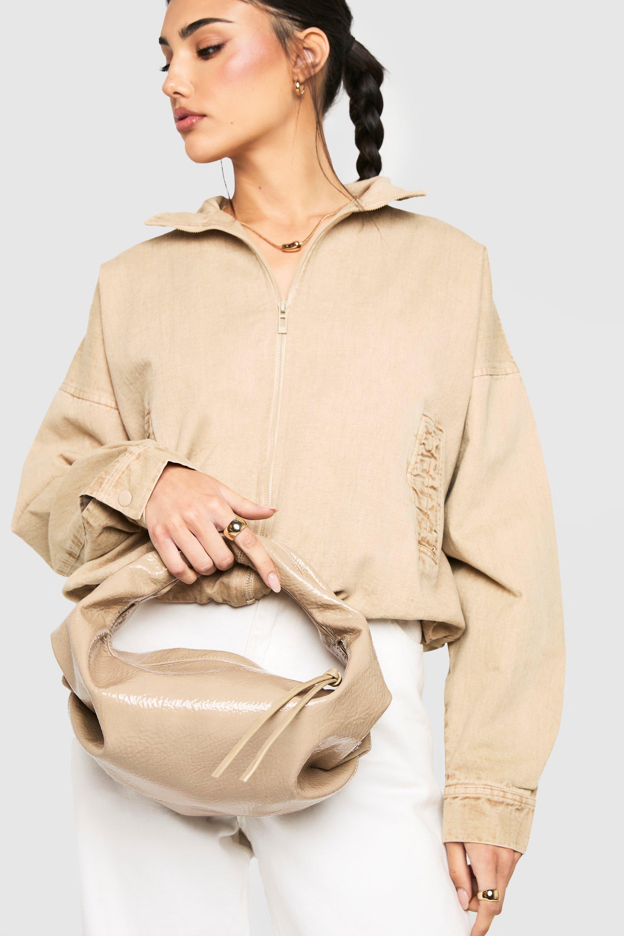 Click to view product details and reviews for Womens Textured Patent Slouchy Grab Bag Beige One Size Beige.