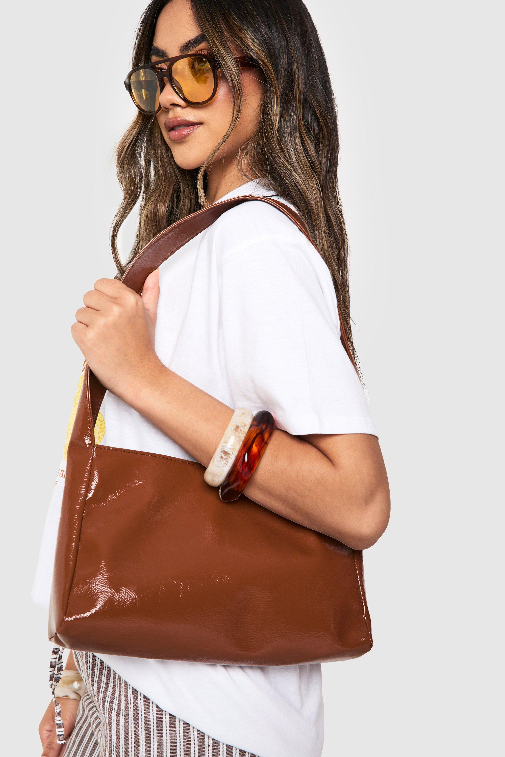 Click to view product details and reviews for Womens Textured Patent Shoulder Bag Brown One Size Brown.