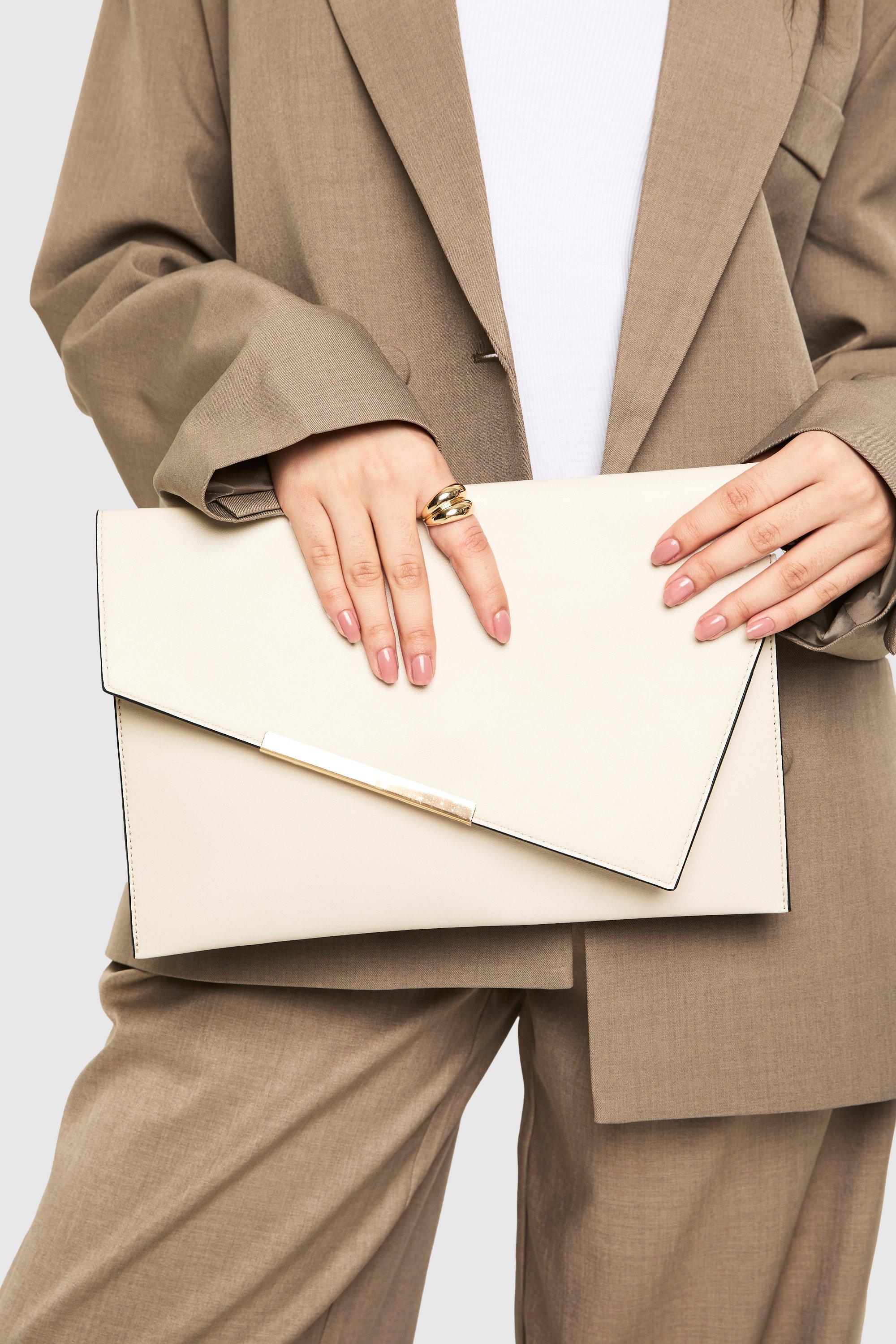 Click to view product details and reviews for Womens Asymmetric Fold Over Large Envelope Clutch Bag Cream One Size Cream.