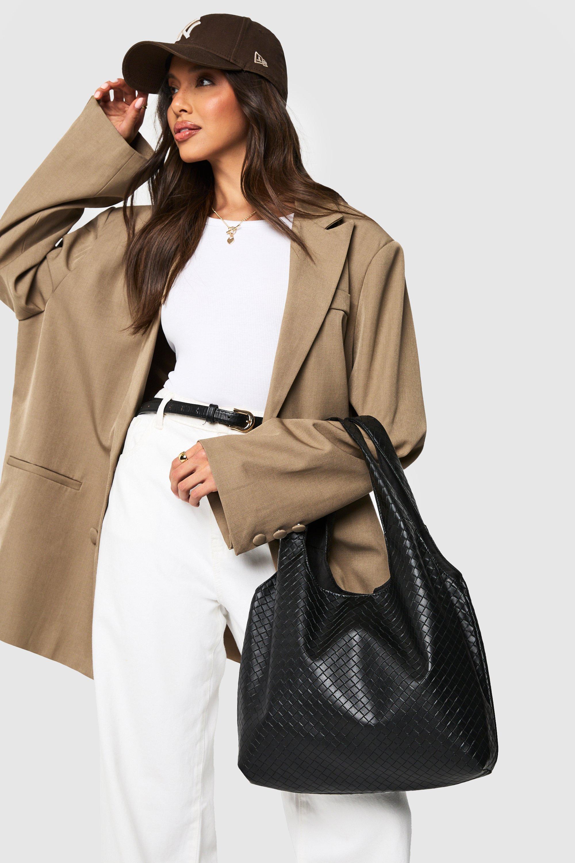 Click to view product details and reviews for Womens Woven Slouchy Tote Bag Black One Size Black.