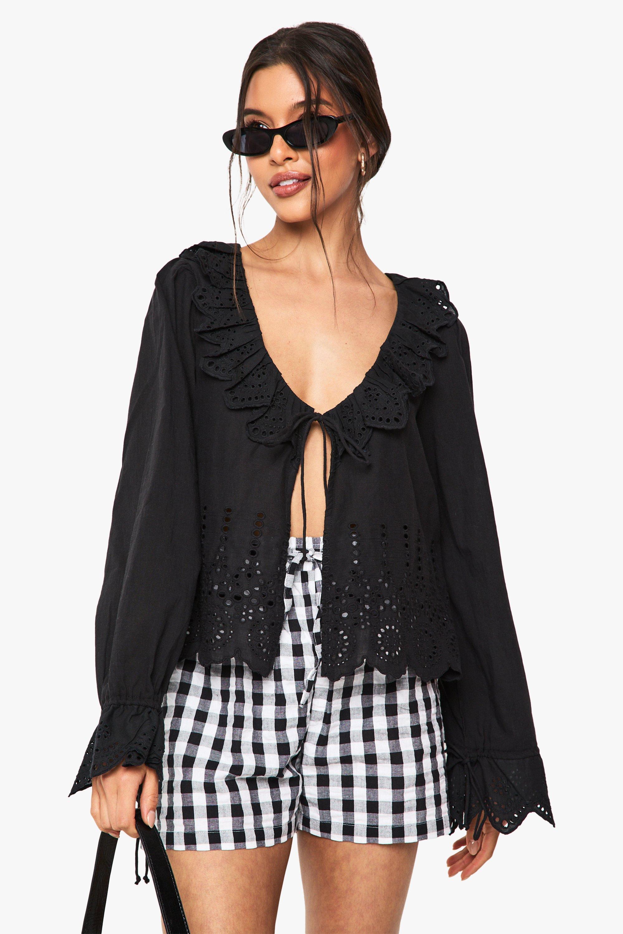 Image of Blusa in pizzo sangallo con arricciature e laccetti, Nero