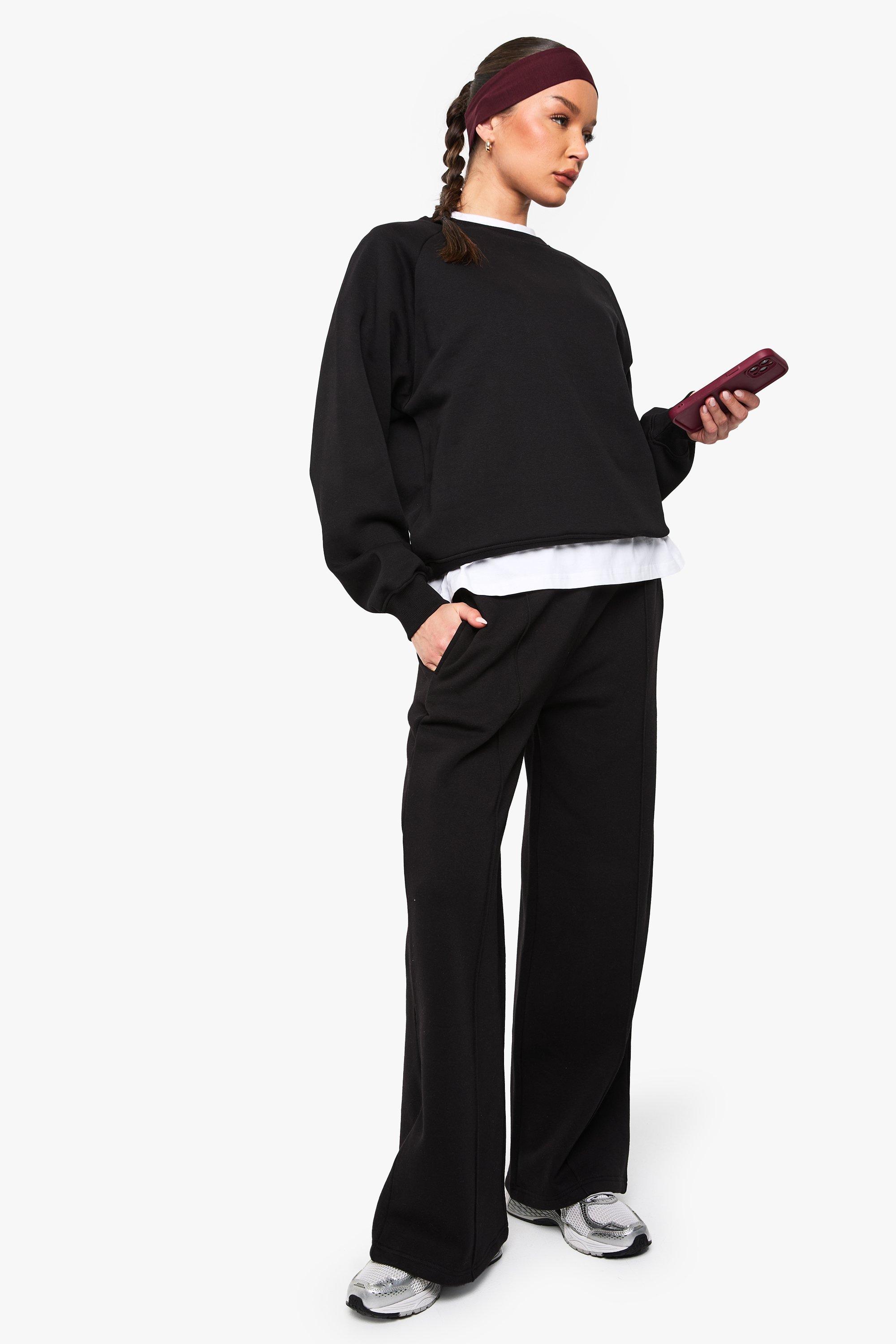 Image of Pantaloni tuta dritti con nervature, Nero