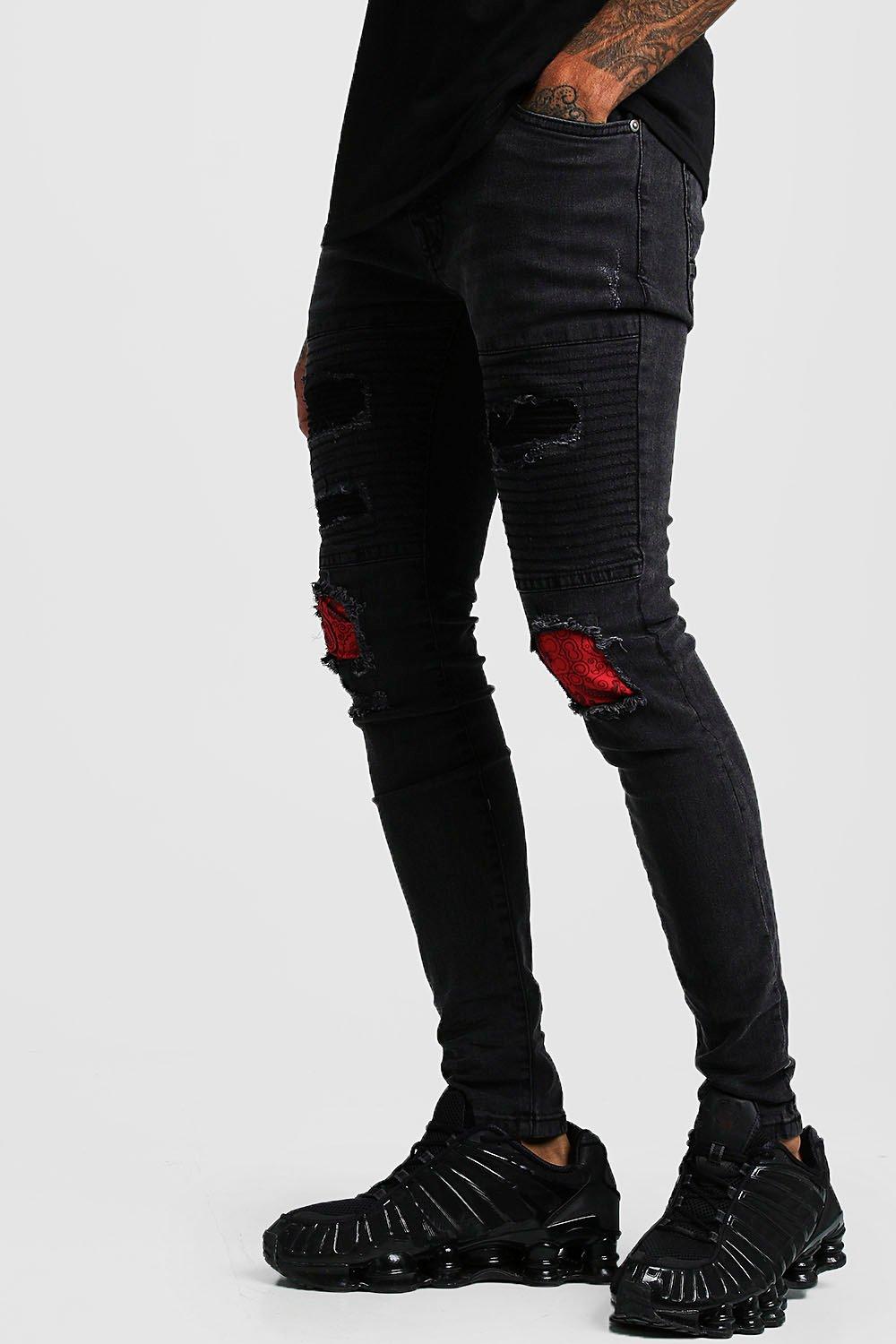 black ripped and repaired jeans