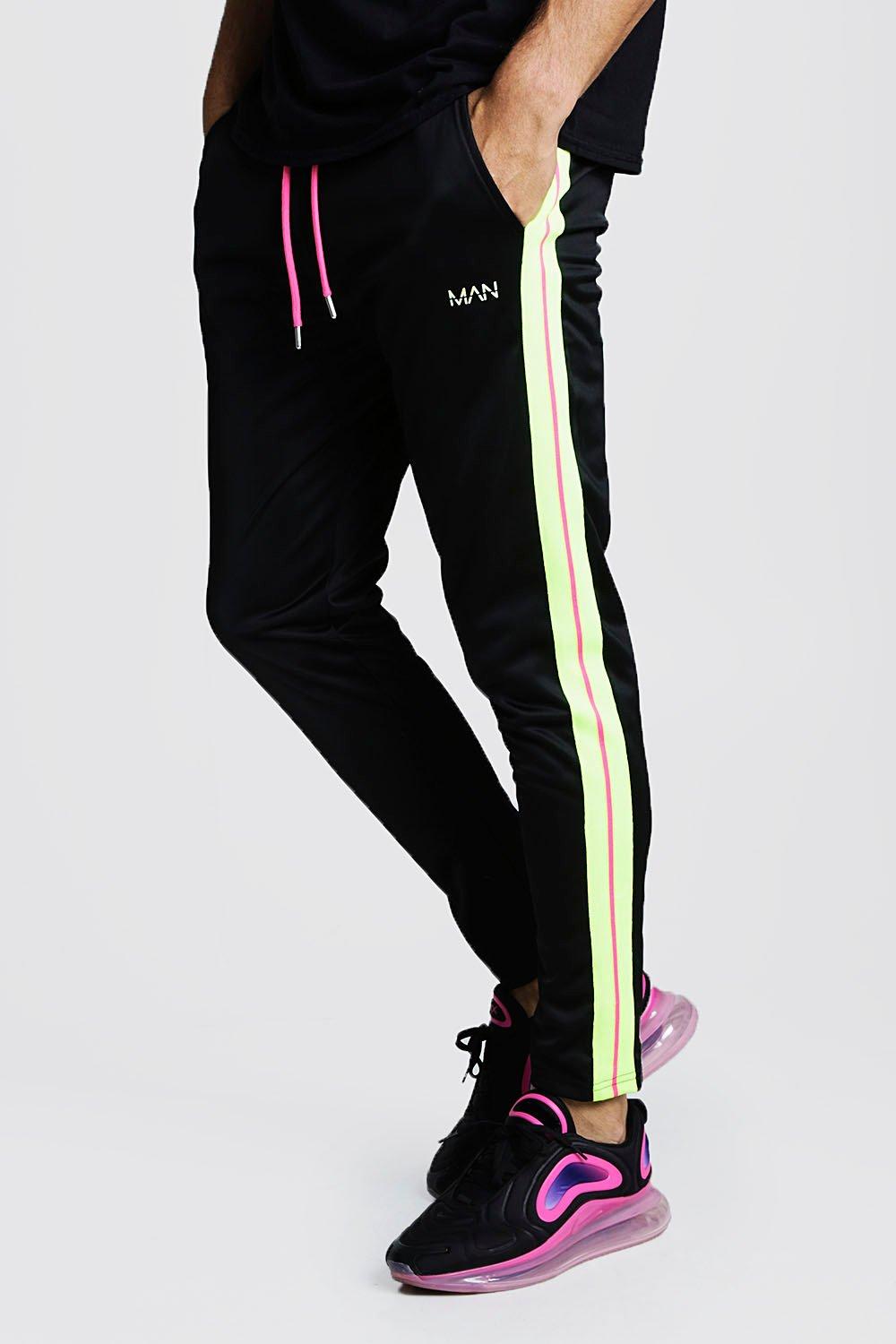 black joggers with yellow side stripe