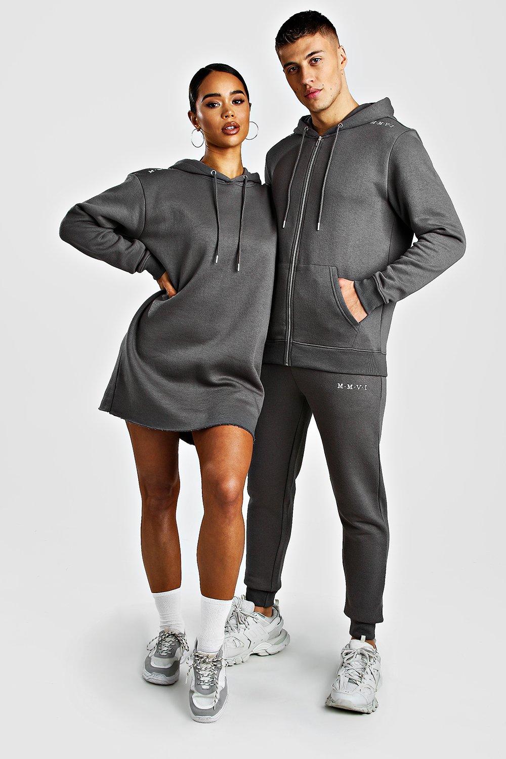 male and female matching tracksuits