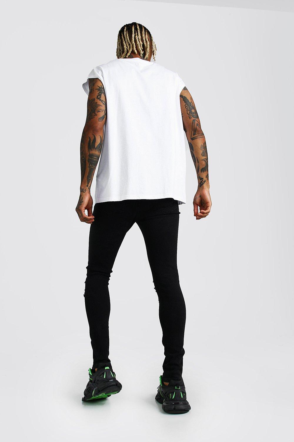 black busted knee skinny jeans