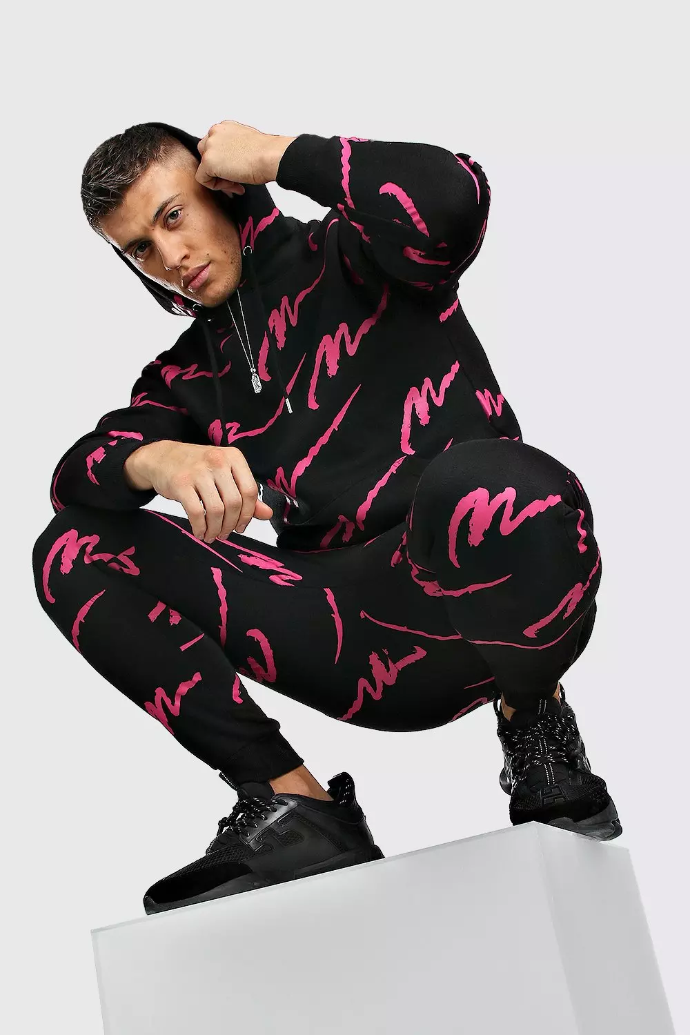 All over man printed hooded hot sale tracksuit black