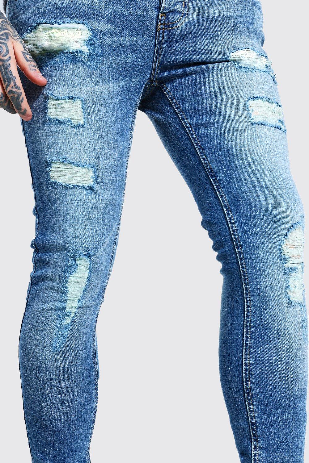 ripped all over jeans