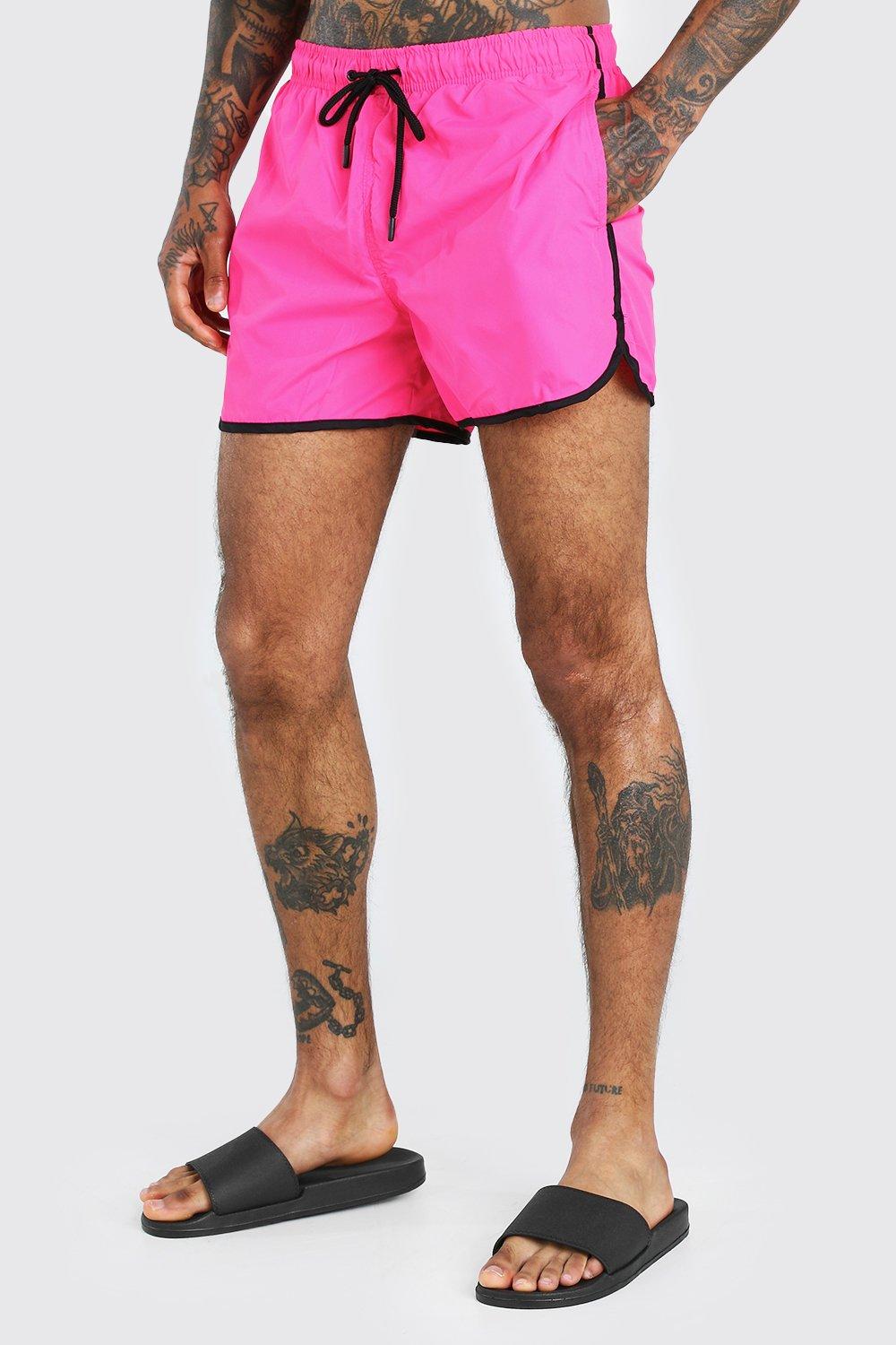 neon pink swim shorts