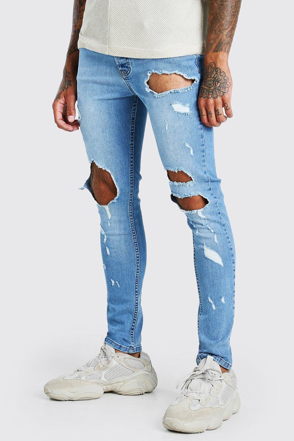 all over ripped jeans