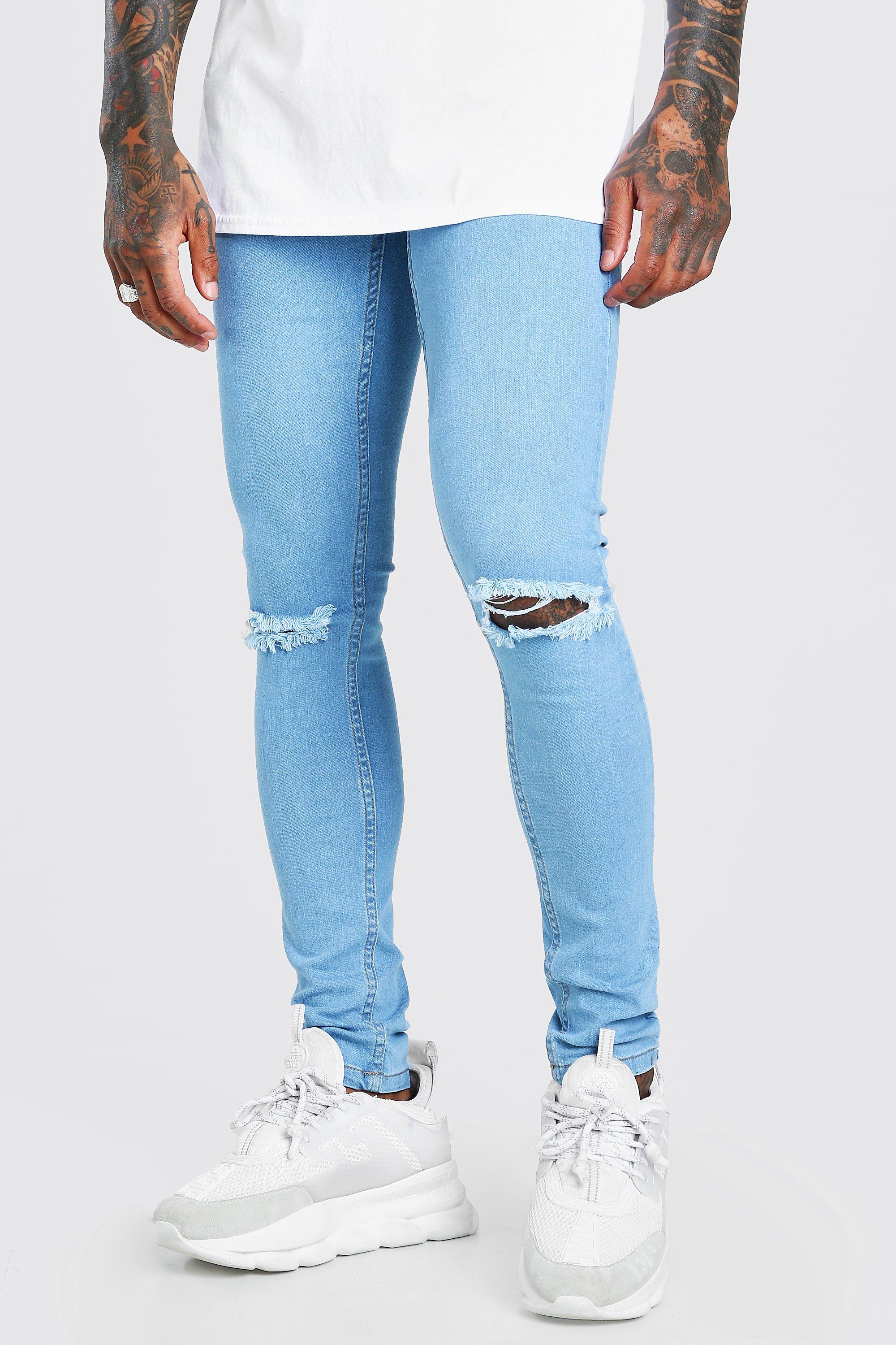 light blue ripped knee skinny jeans