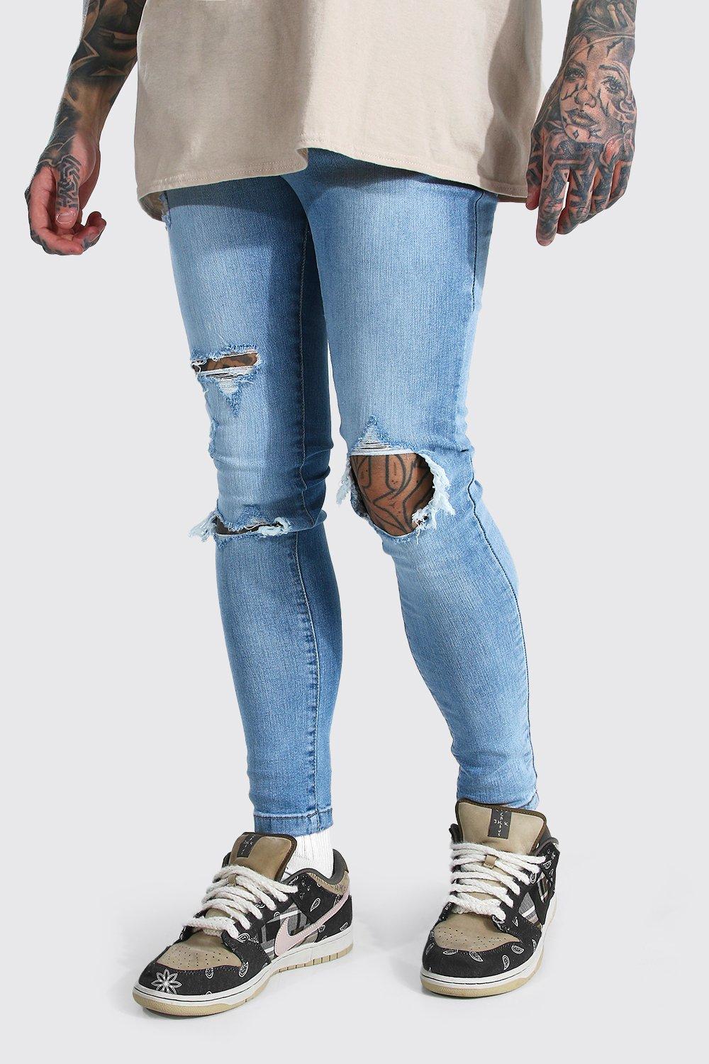 blue ripped knee skinny jeans