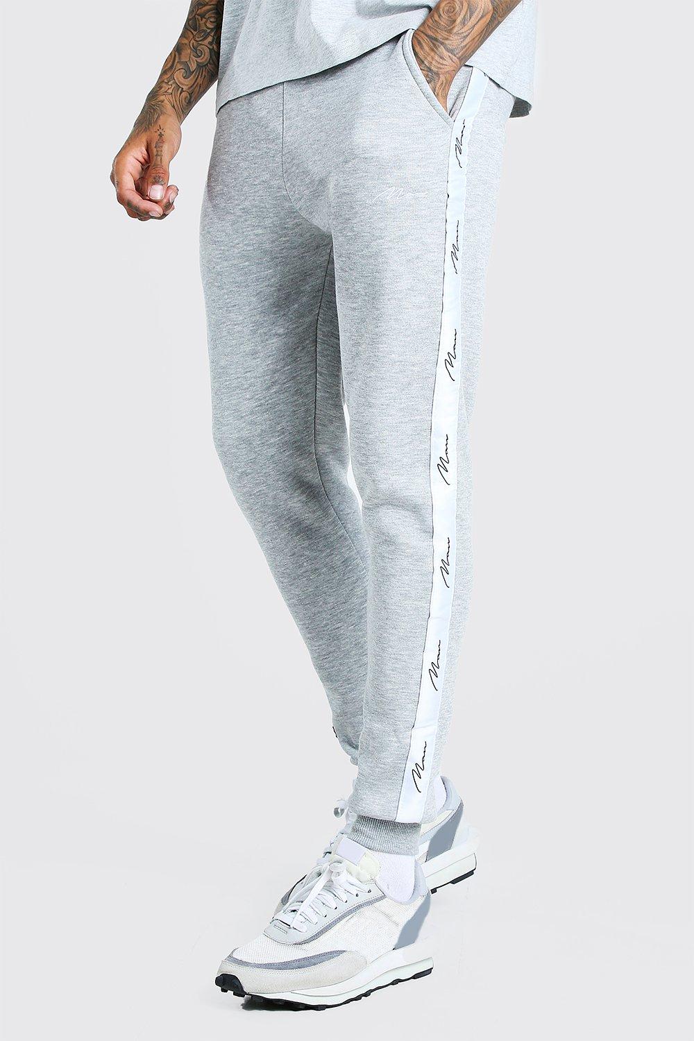 man signature skinny fit jacquard tracksuit with tape