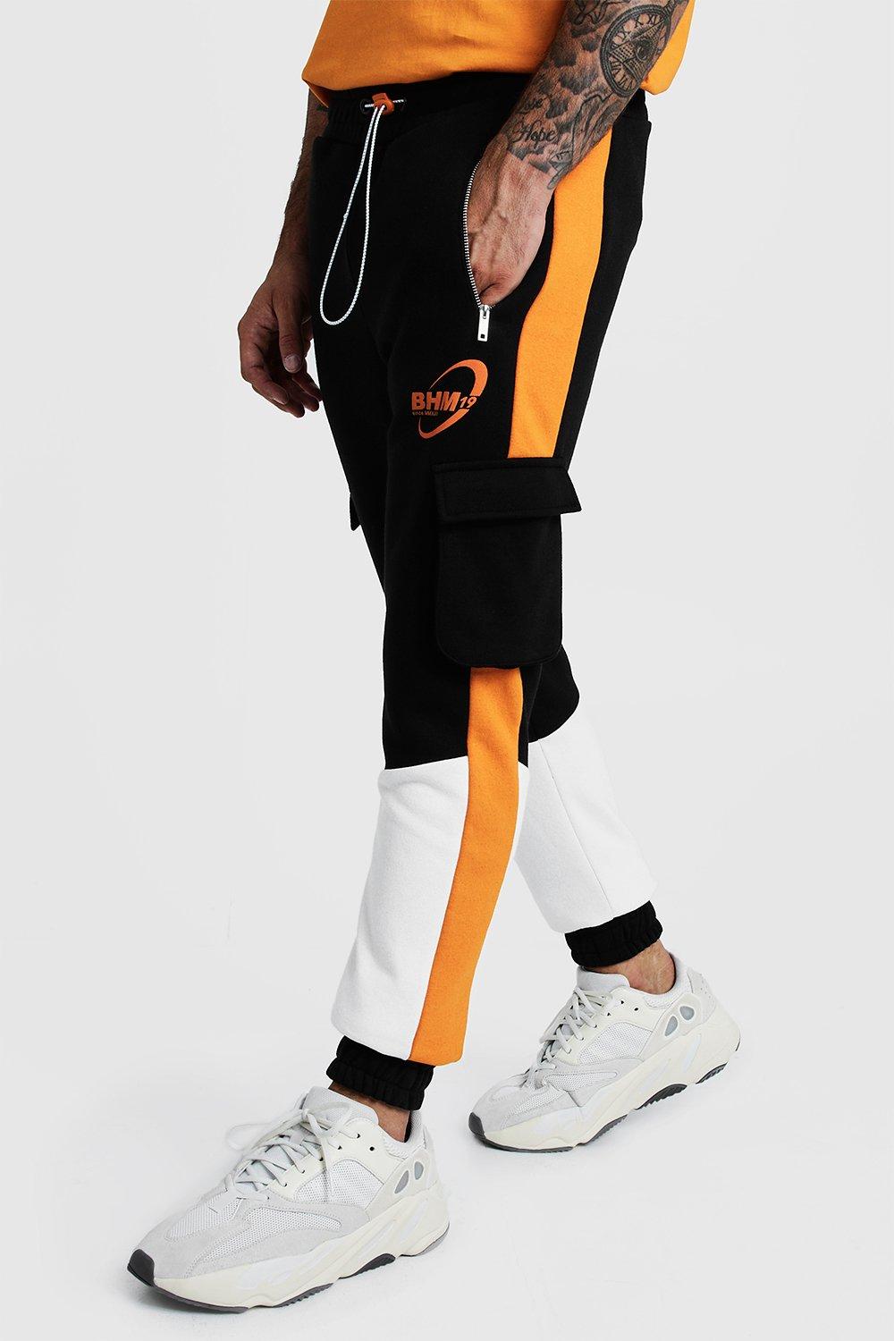 orange and black joggers