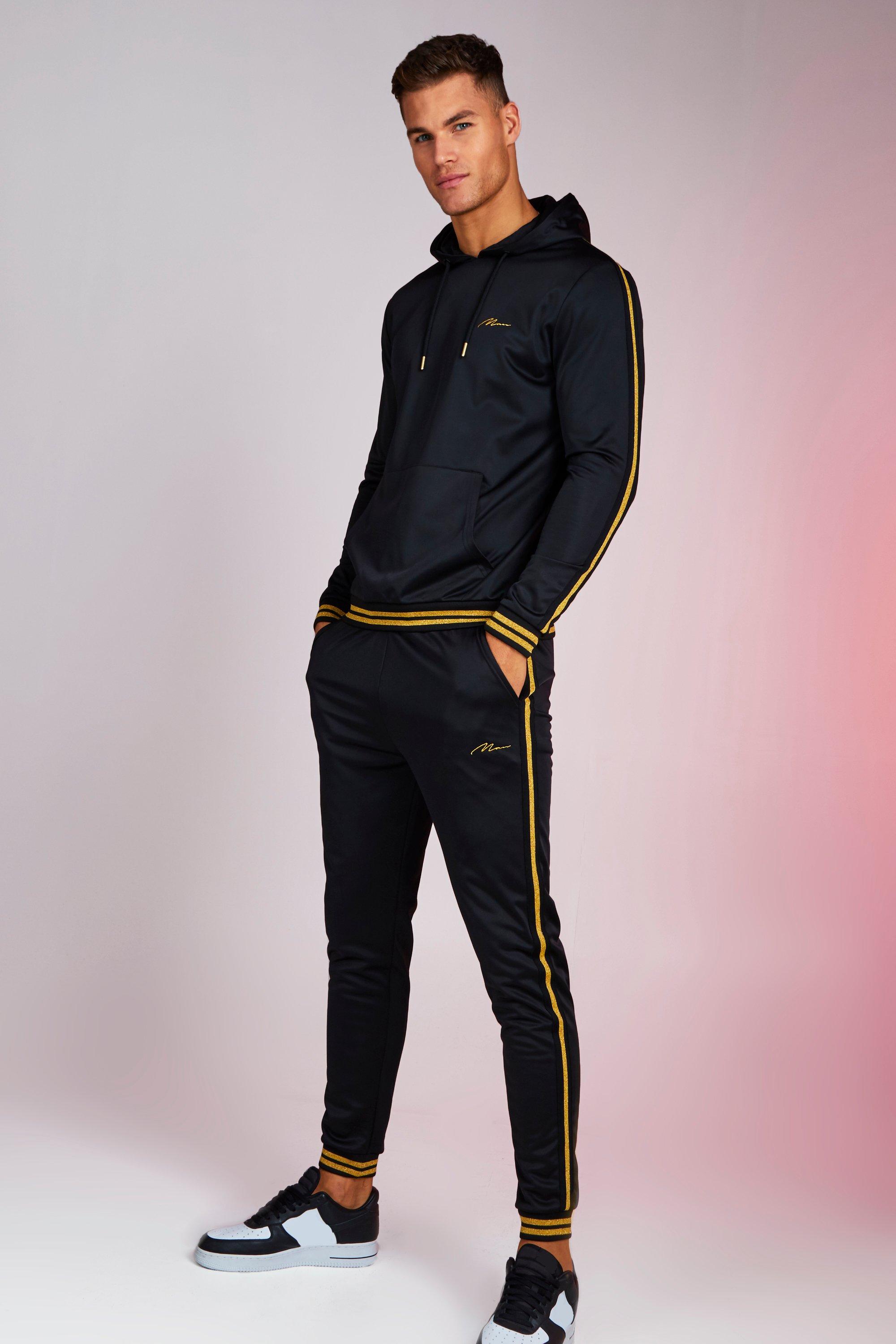 black and gold sweatsuit