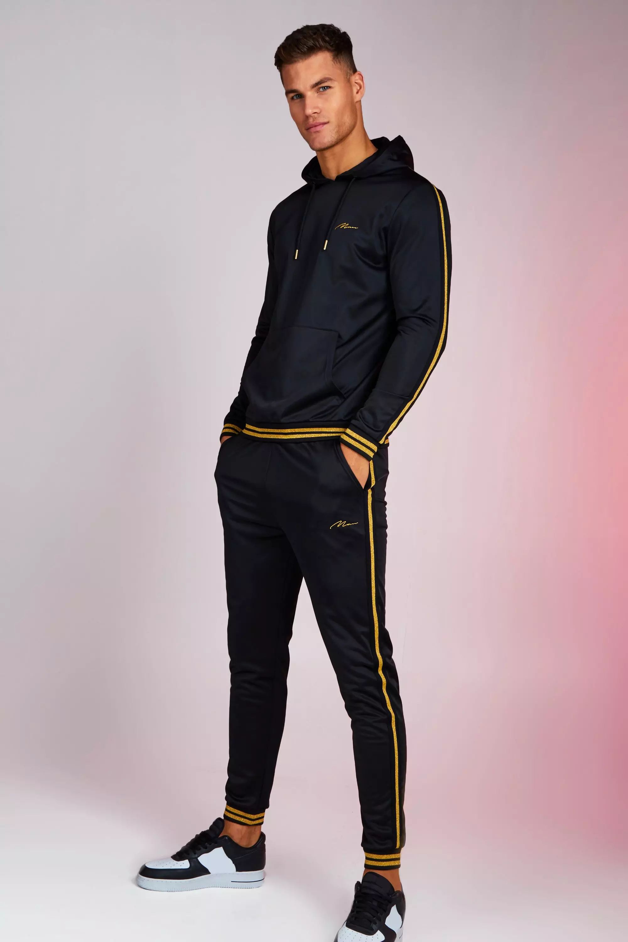 Nike gold tracksuit best sale