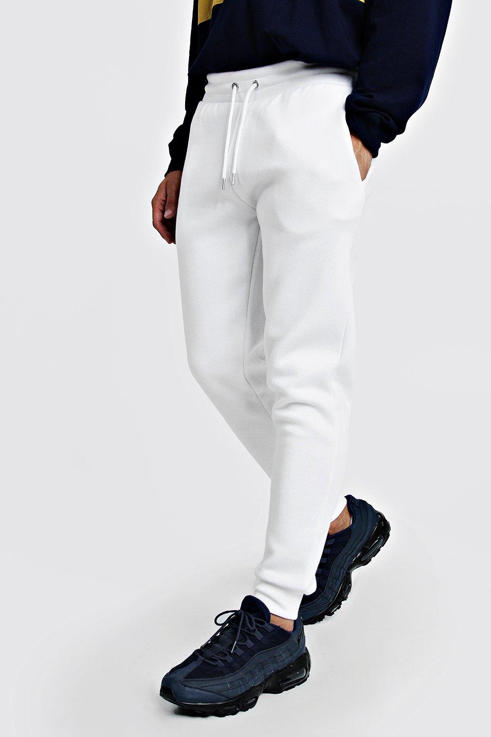 white slim joggers