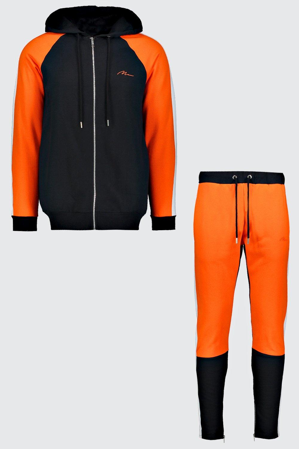 orange colour tracksuit