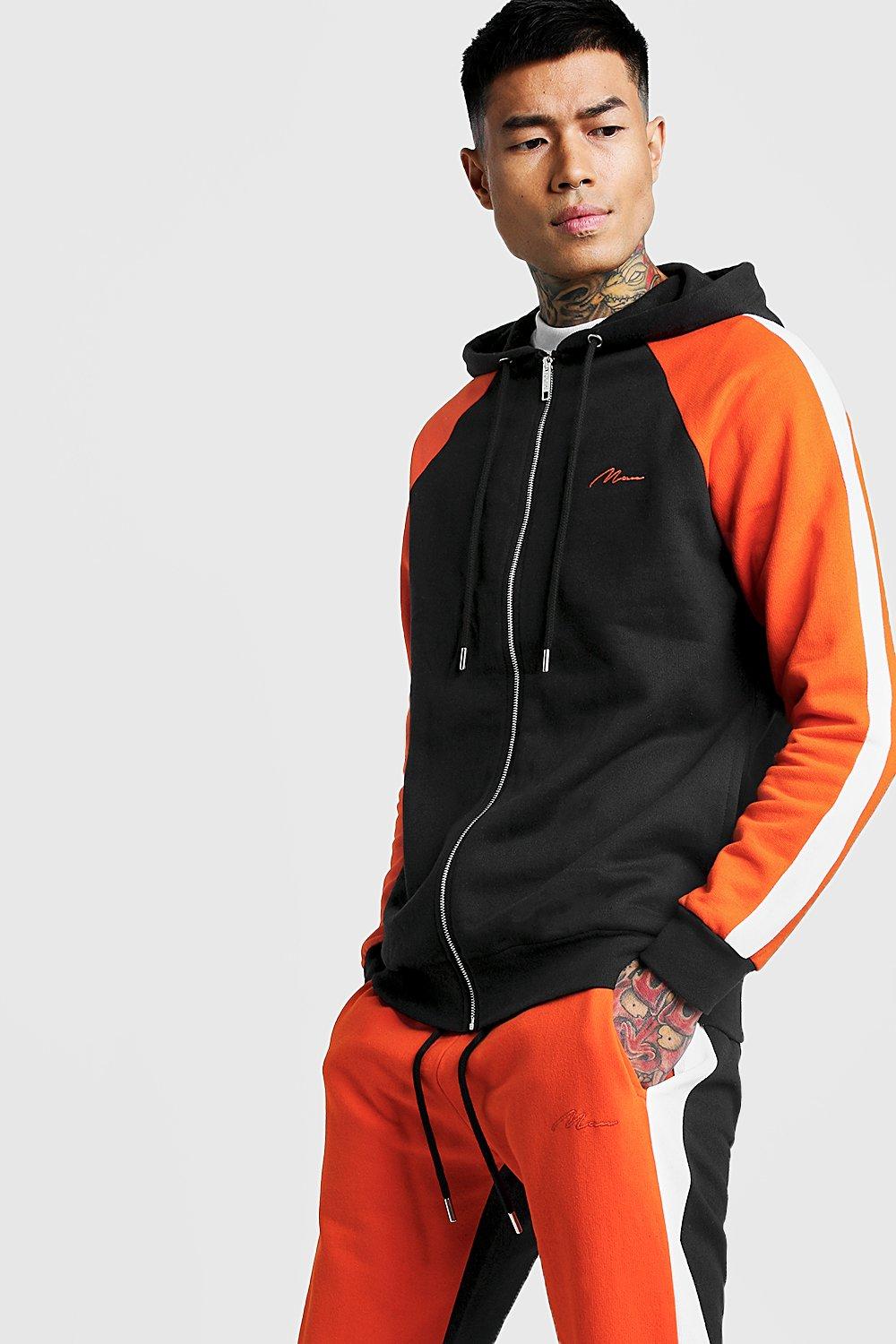 orange colour tracksuit